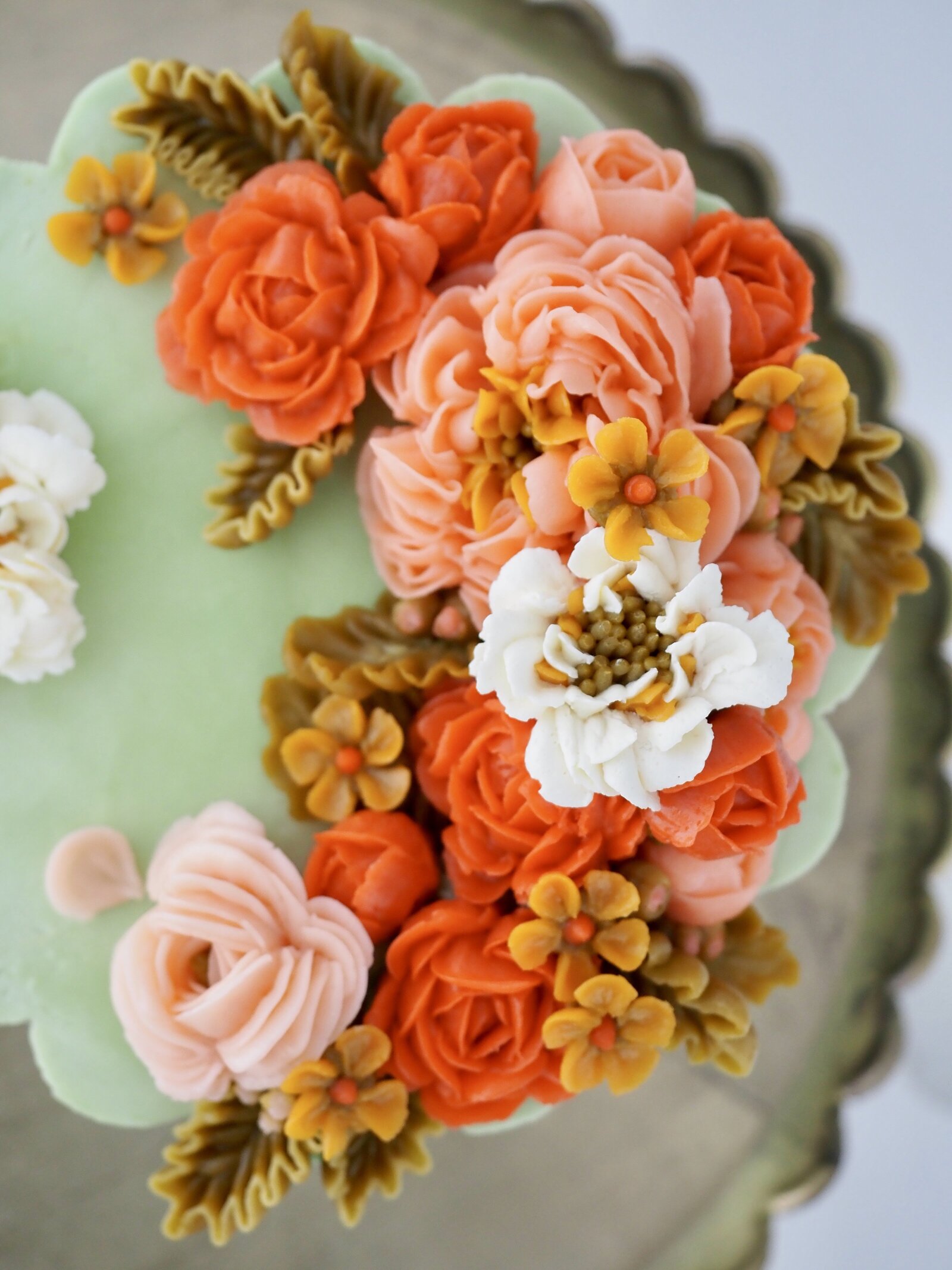 Floral buttercream cake with hand piped flowers