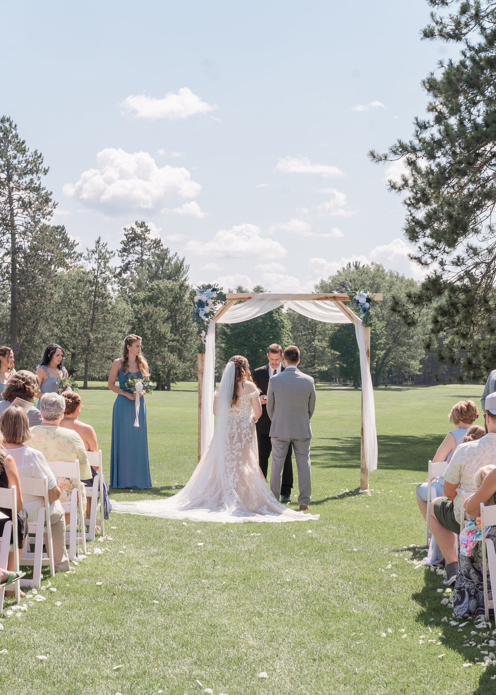 wedding ceremony at pine grove in iron mountain