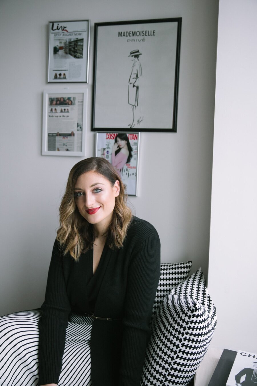 Portrait of woman in black and white room and outfit