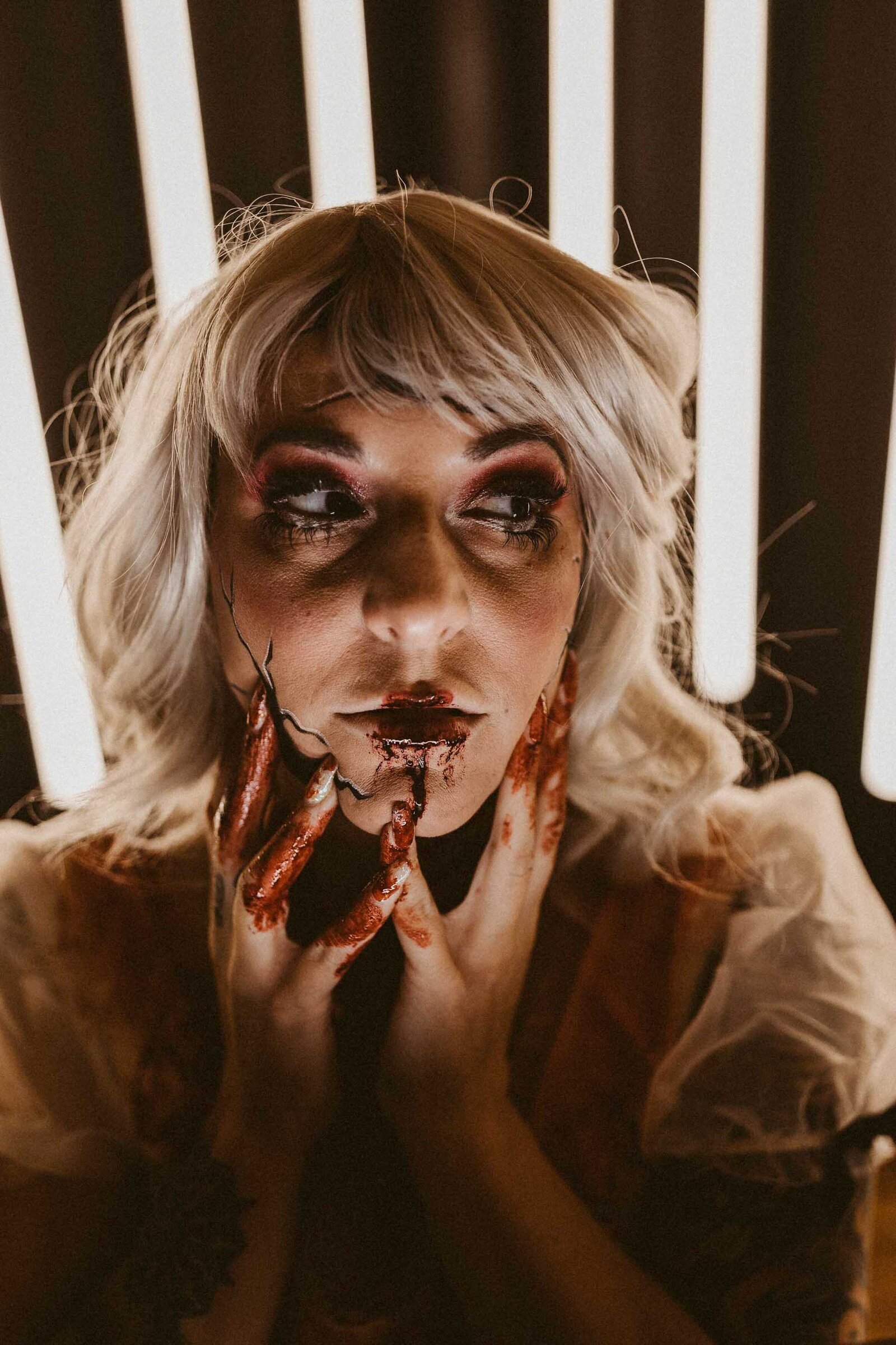 woman with a scary looking makeup 
