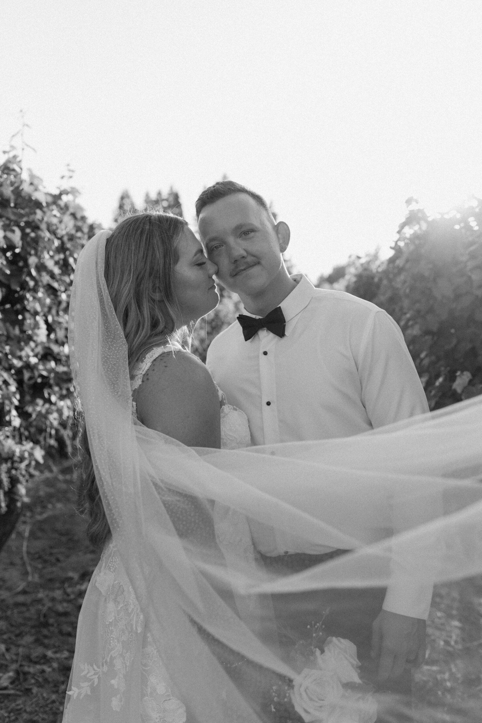 black and white photo of bride and groom