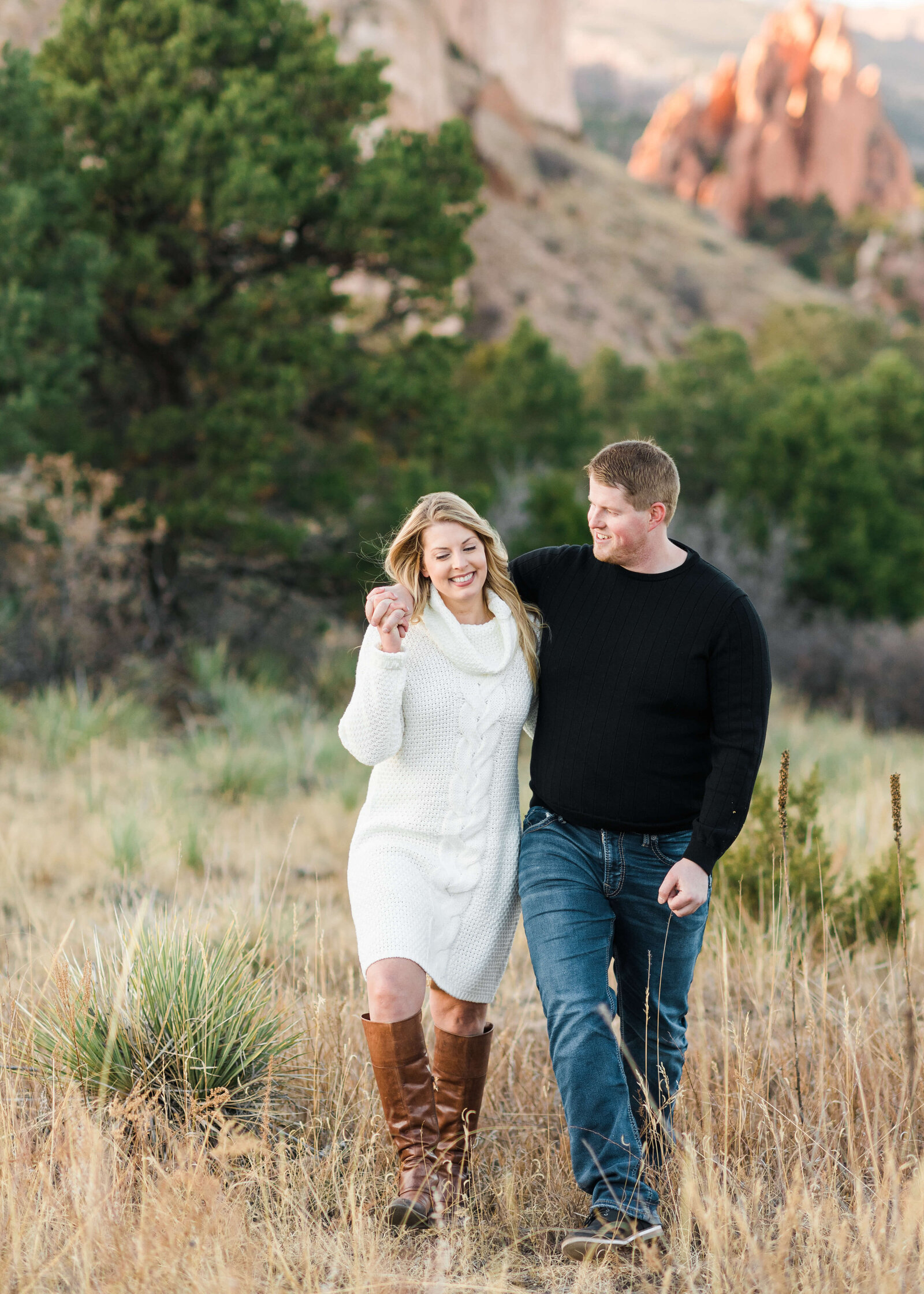 Couple walking together during engagement session by Denver Wedding Photographer Erin Winter Photography
