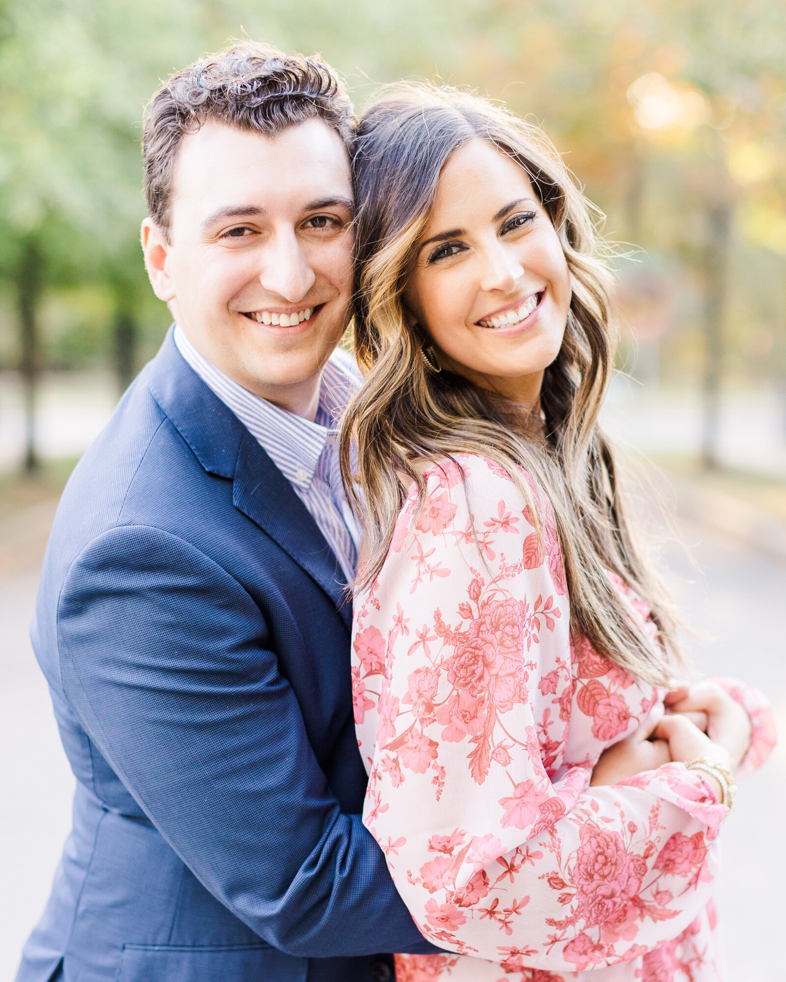 Sarah Kate and Thomas embracing with radiant smiles during their Alabama engagement session by Abby Bell Photography, Fine Art Wedding Photographer.