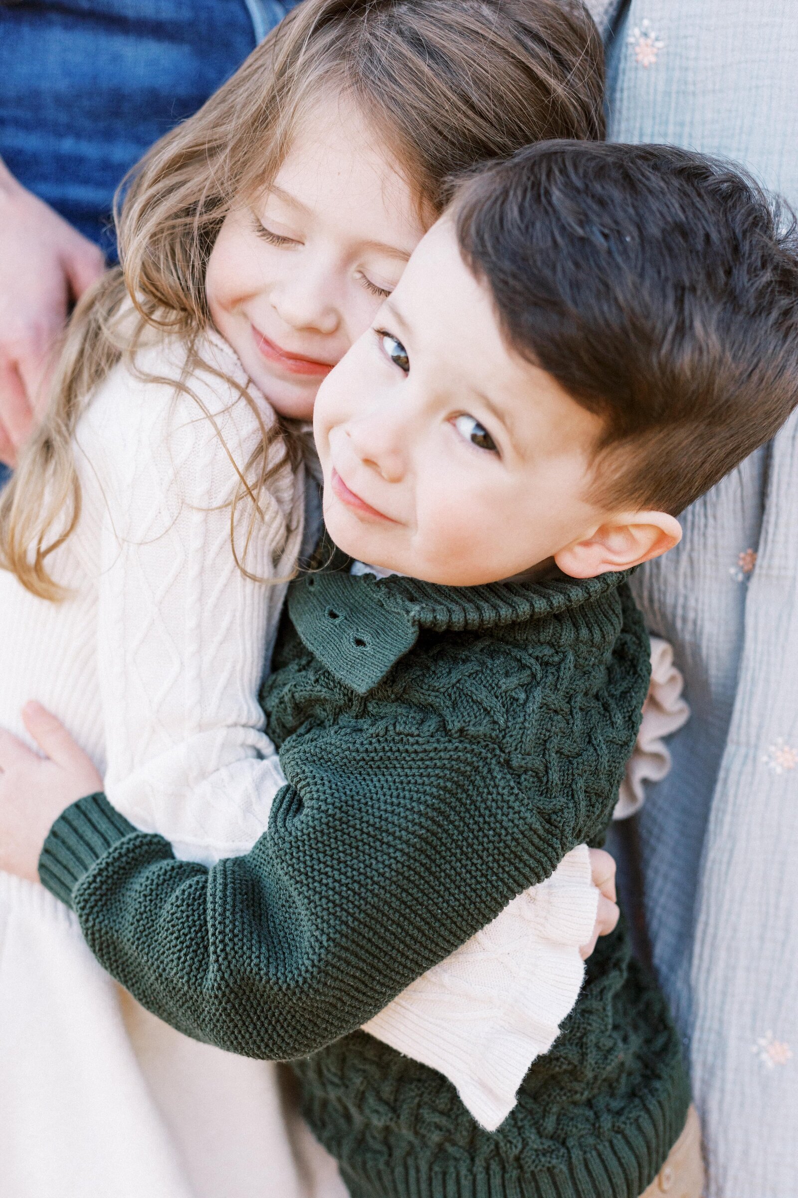 siblings hugging during peoria illinois family photos 