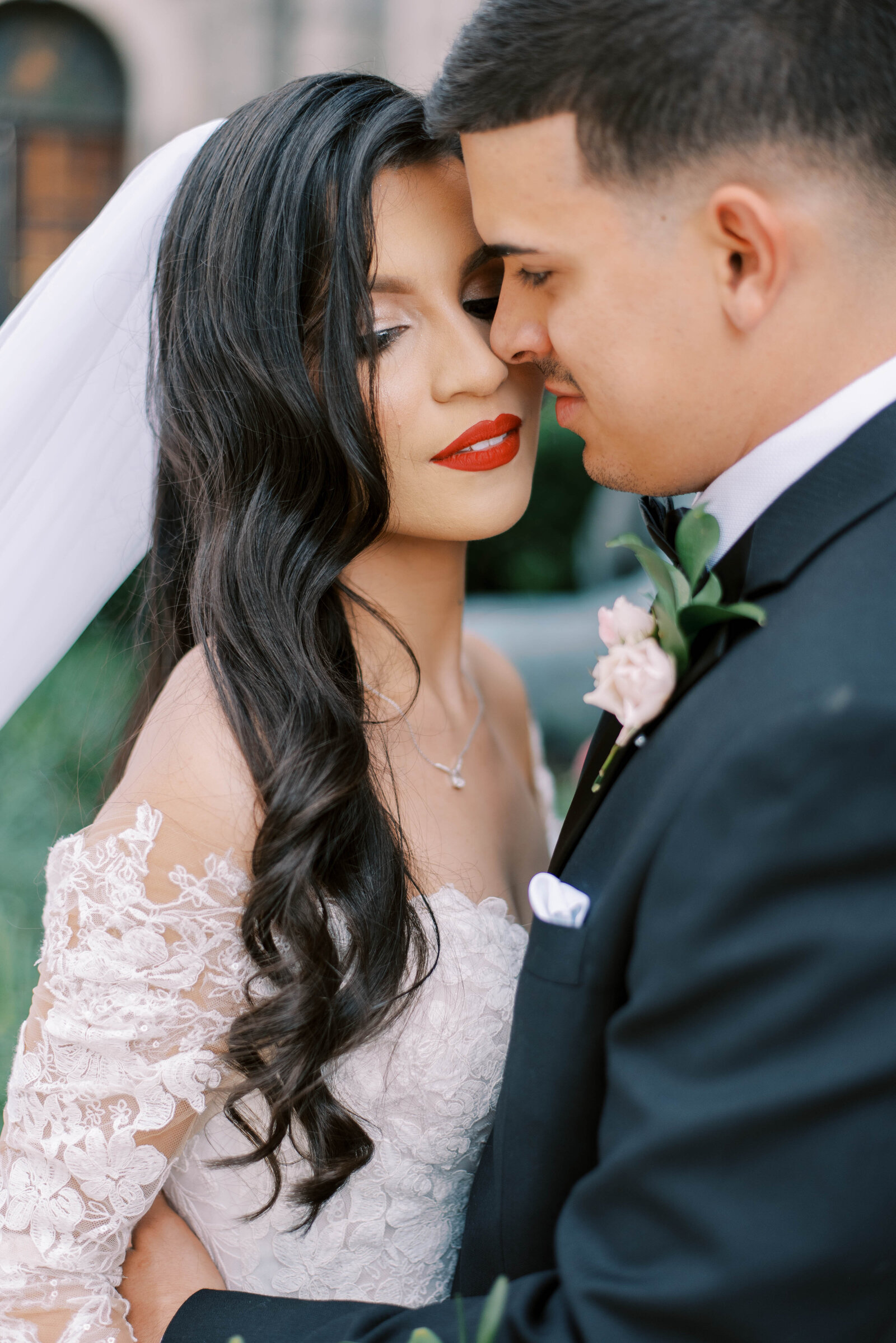 bridal couple hugging during wedding day portraits