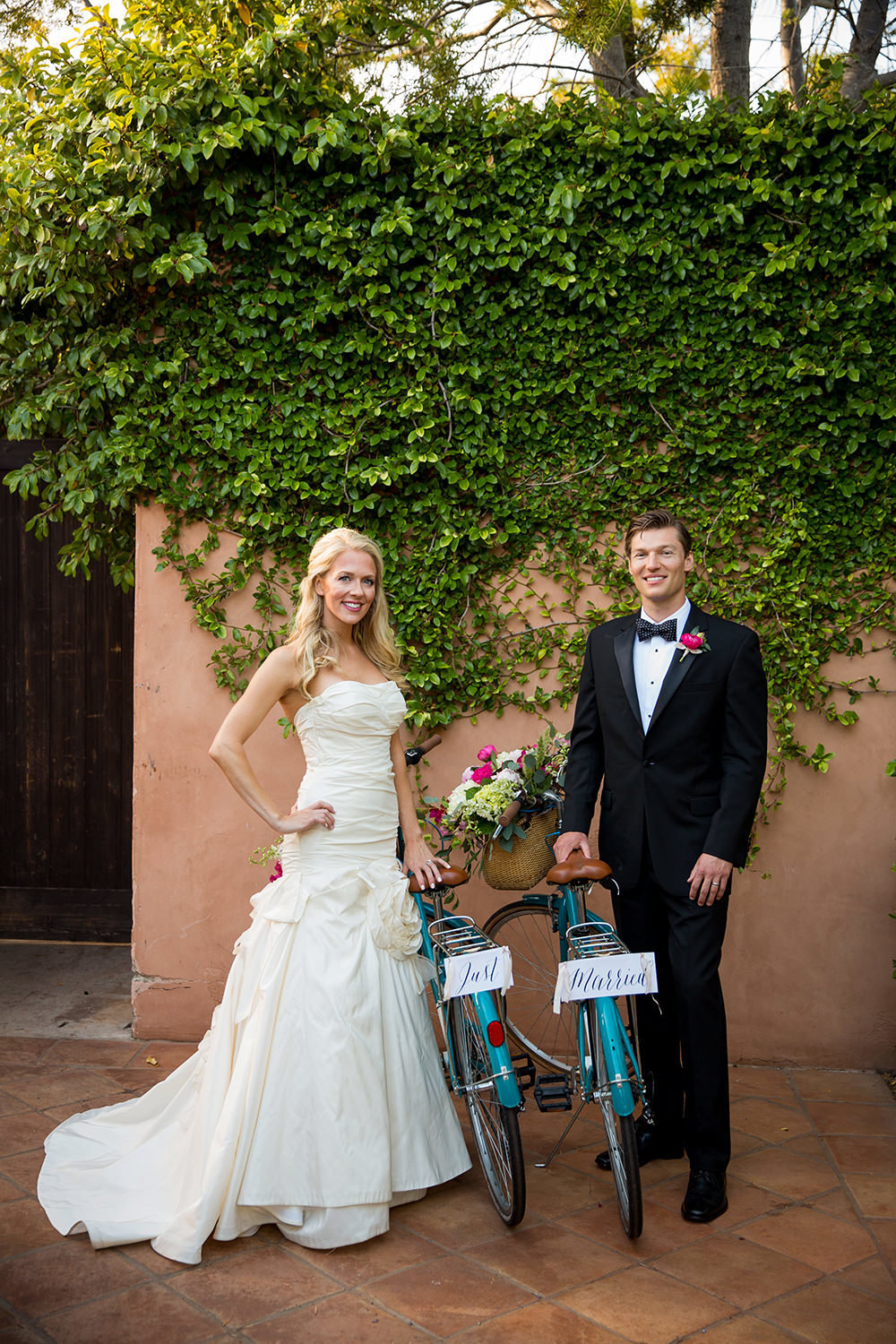 Cute Portrait of Wedding Couple with Bicycles