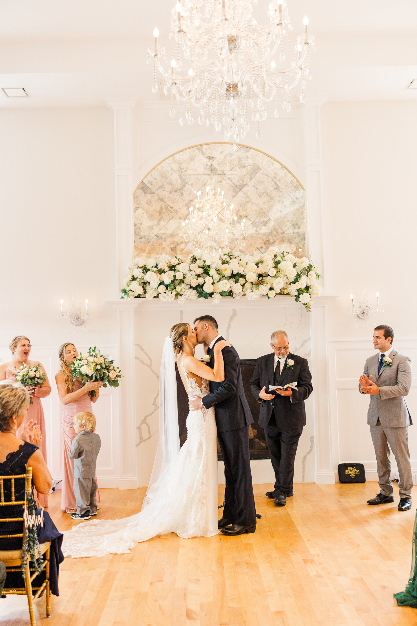  Bride and groom share their first kiss during wedding ceremony at SkyView Golf Club