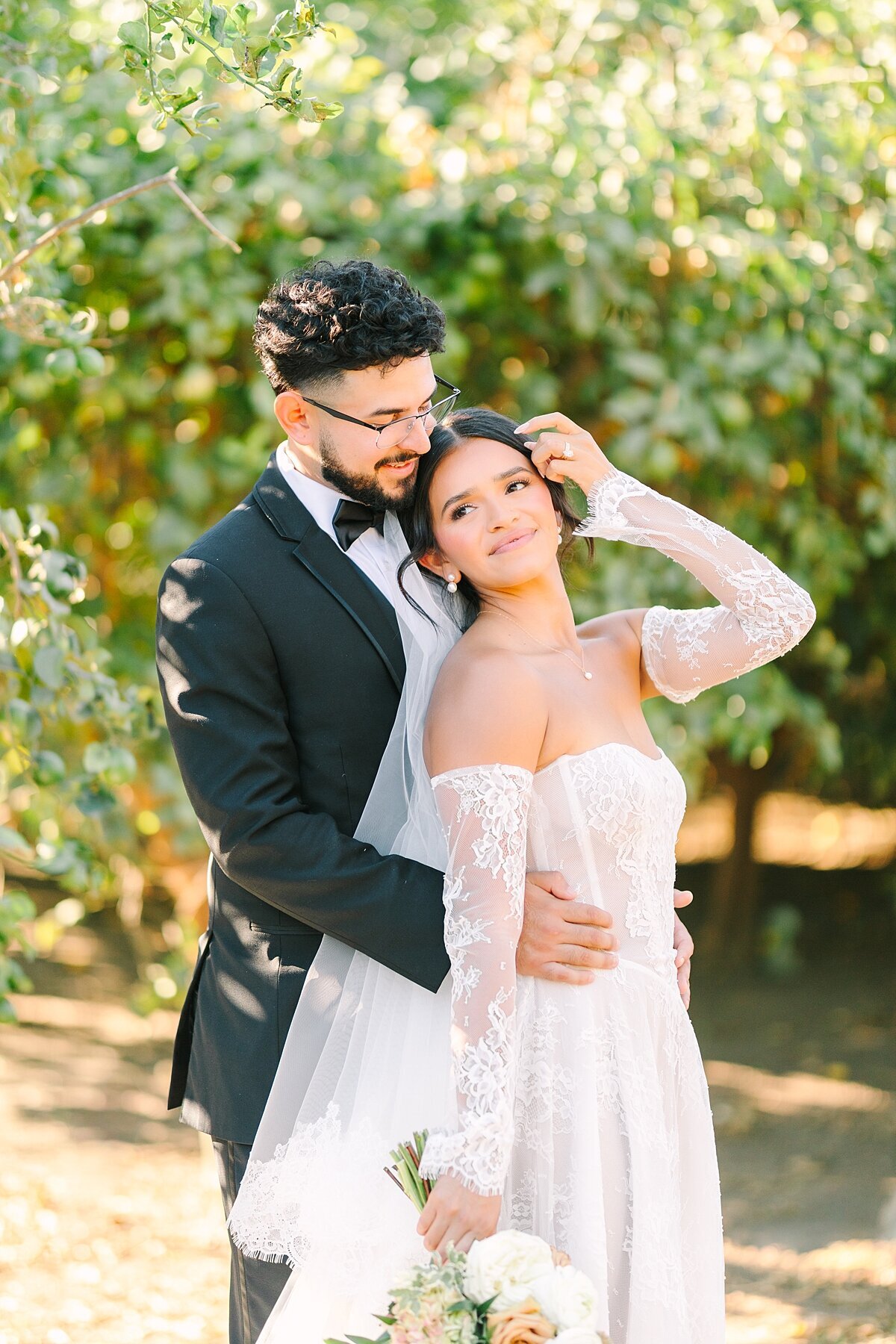 Bride and groom portraits outside of the orchards in Escondido, California.