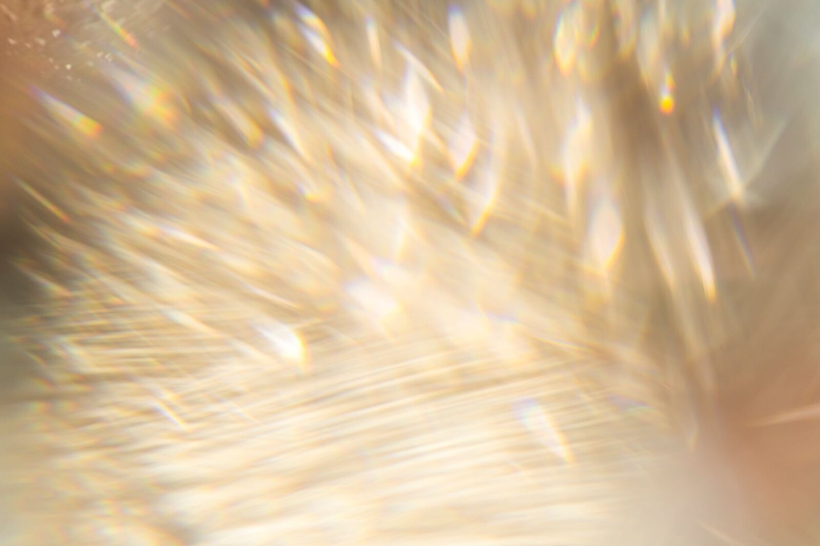 golden blurred specks  forming an abstract background