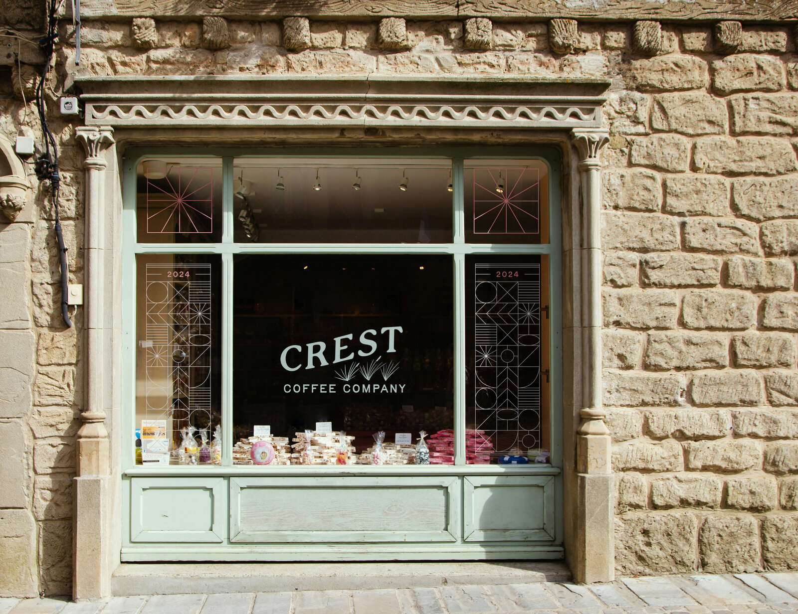 store front sign crest coffee