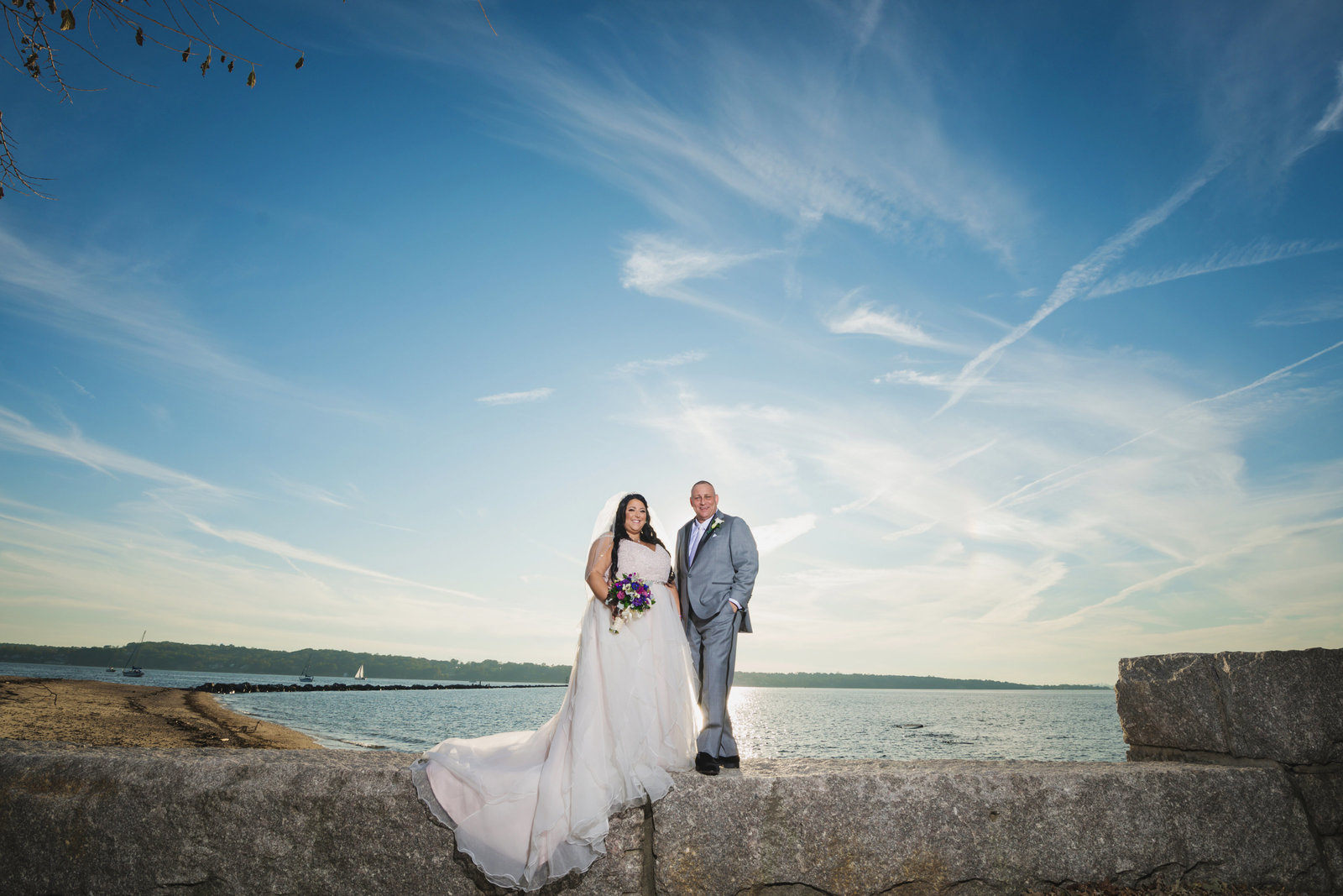 photo of bride and groom near the water on Sea Cliff Manor wedding