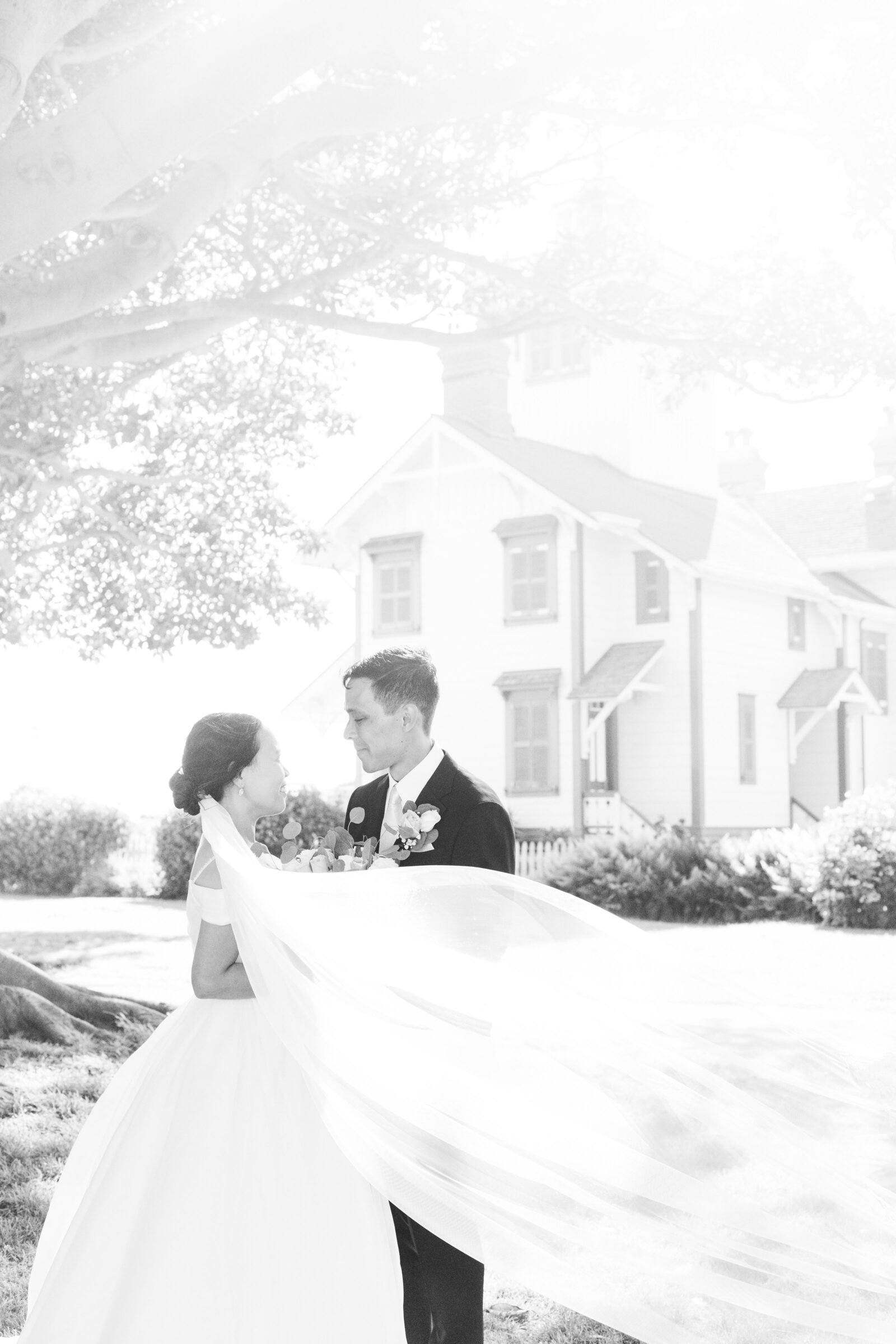A newlywed couple holds hands after their wedding ceremony in San Pedro, Ca.