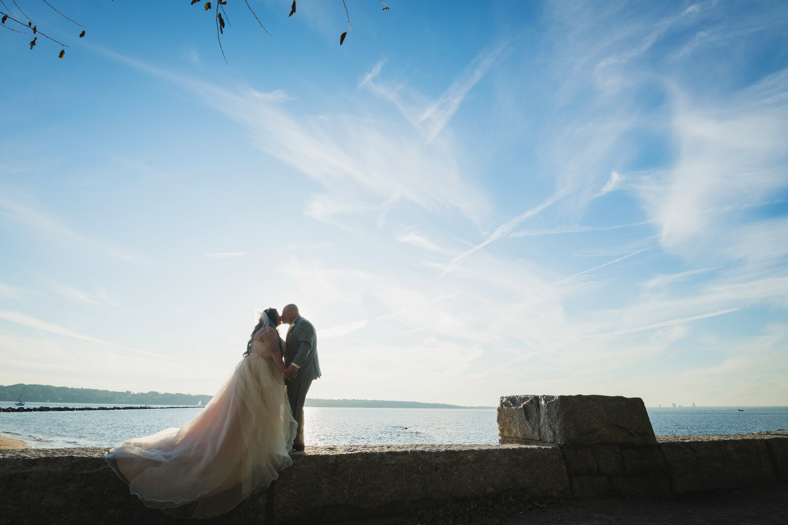 photo of bride and groom near the water at Sea Cliff Manor