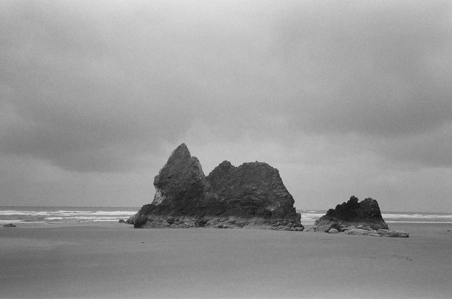 rocks on beach shot in black and white on film camera