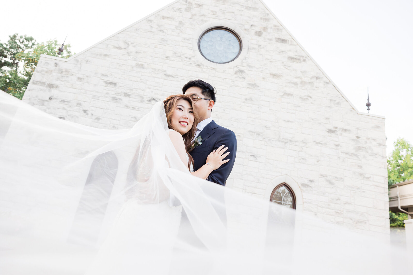 Bride and Groom portrait in front of chapel