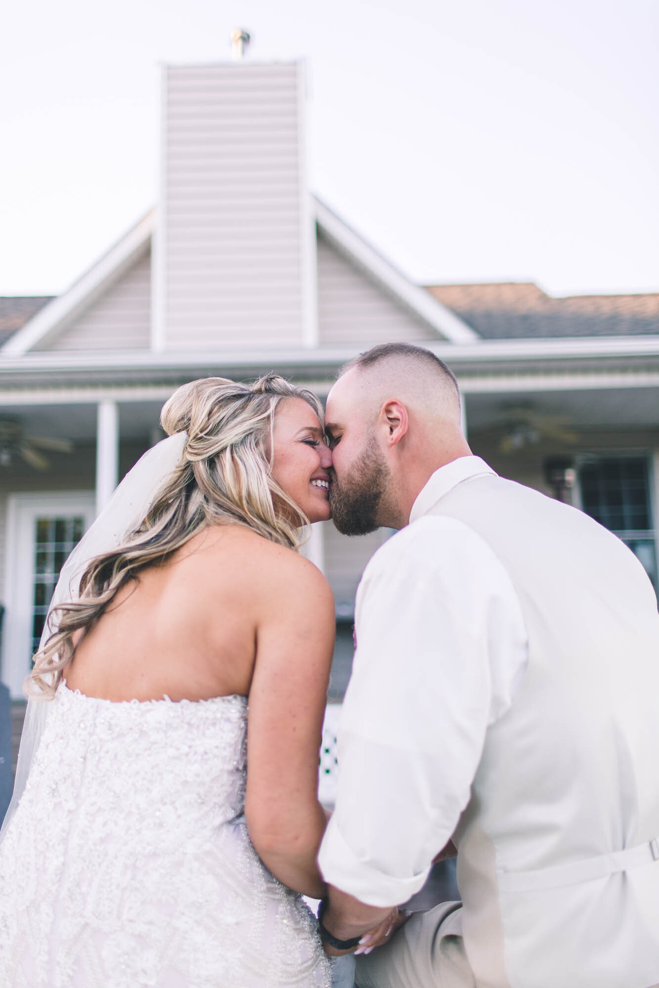 at-home-wedding-bride-groom-kissing-ohio