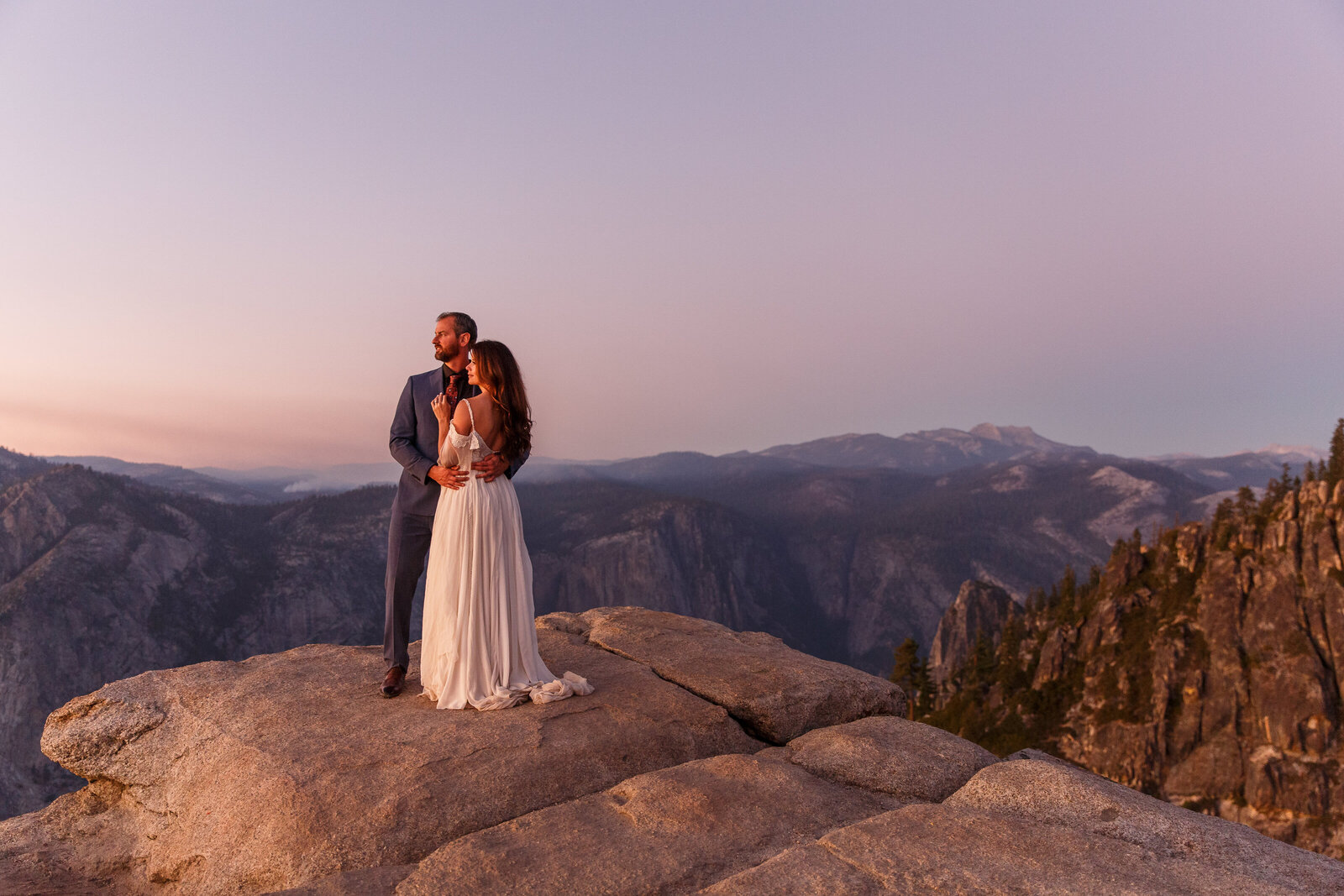 This couple eloped at Taft Point in Yosemite at sunset.