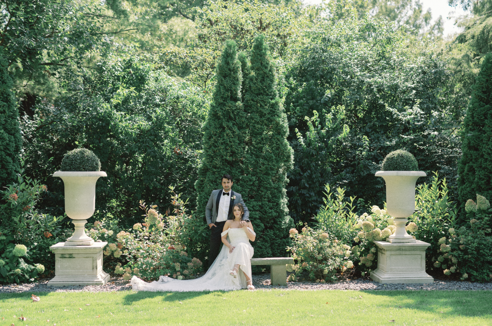 Bride and groom classic portrait in European inspired garden taken by Lacey Graham a Wedding Photographer in Illinois