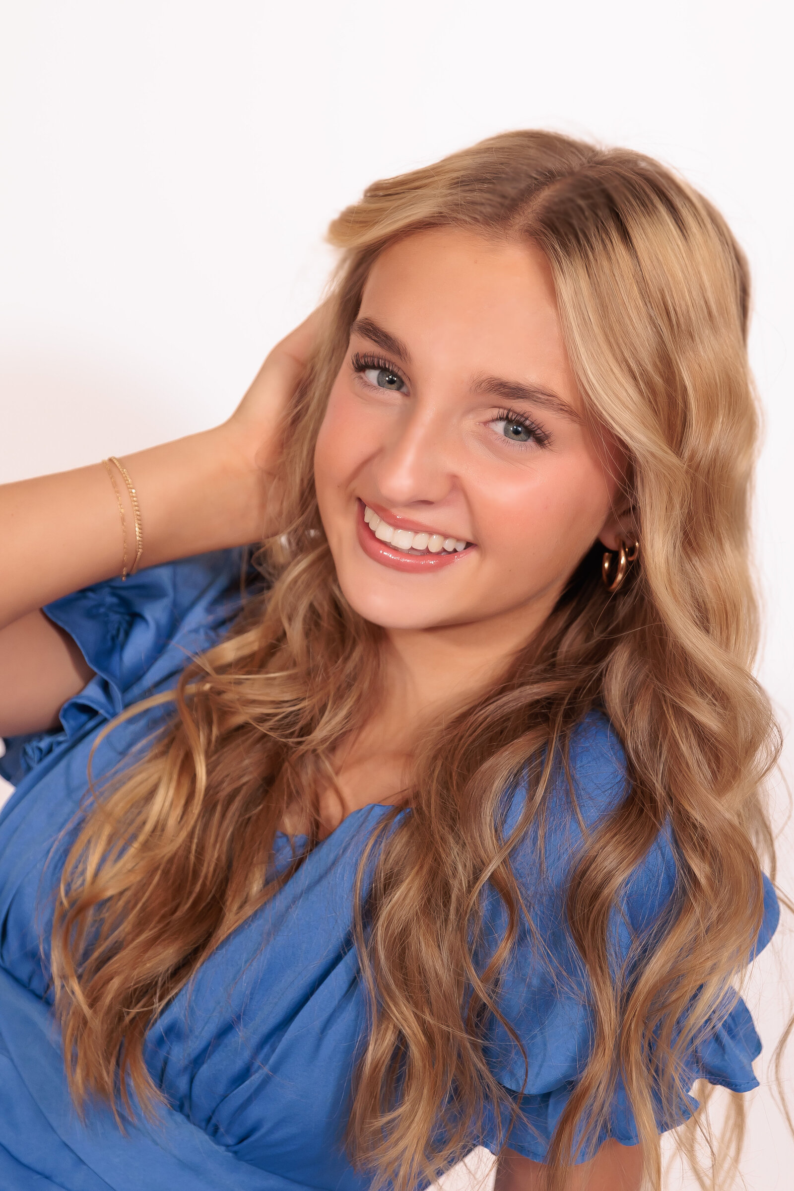 Raleigh Teen Headshots wearing a blue romper for Dance Titlles.