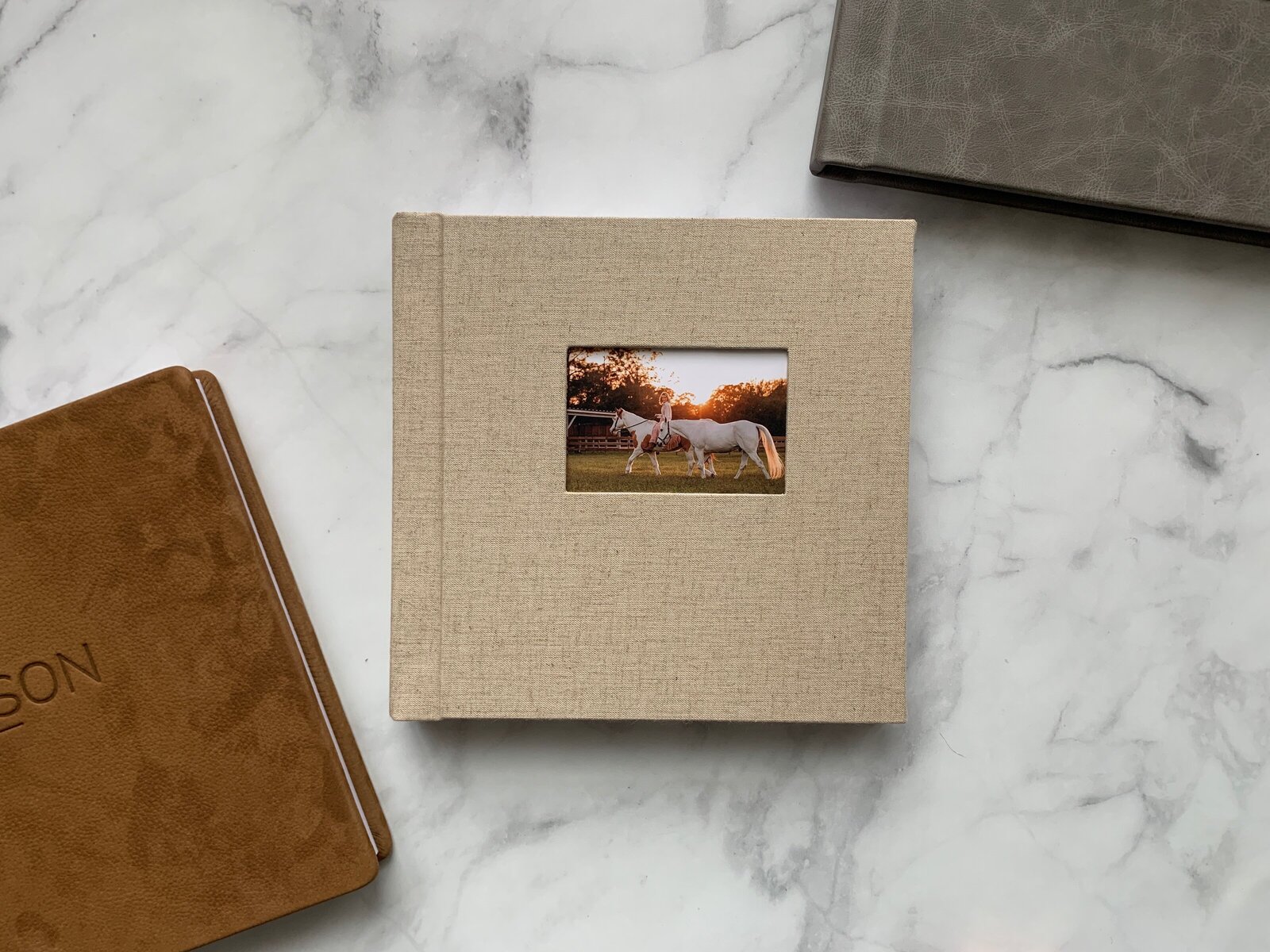 Luxury linen photo album of horse and rider created by Florida equine photographer.