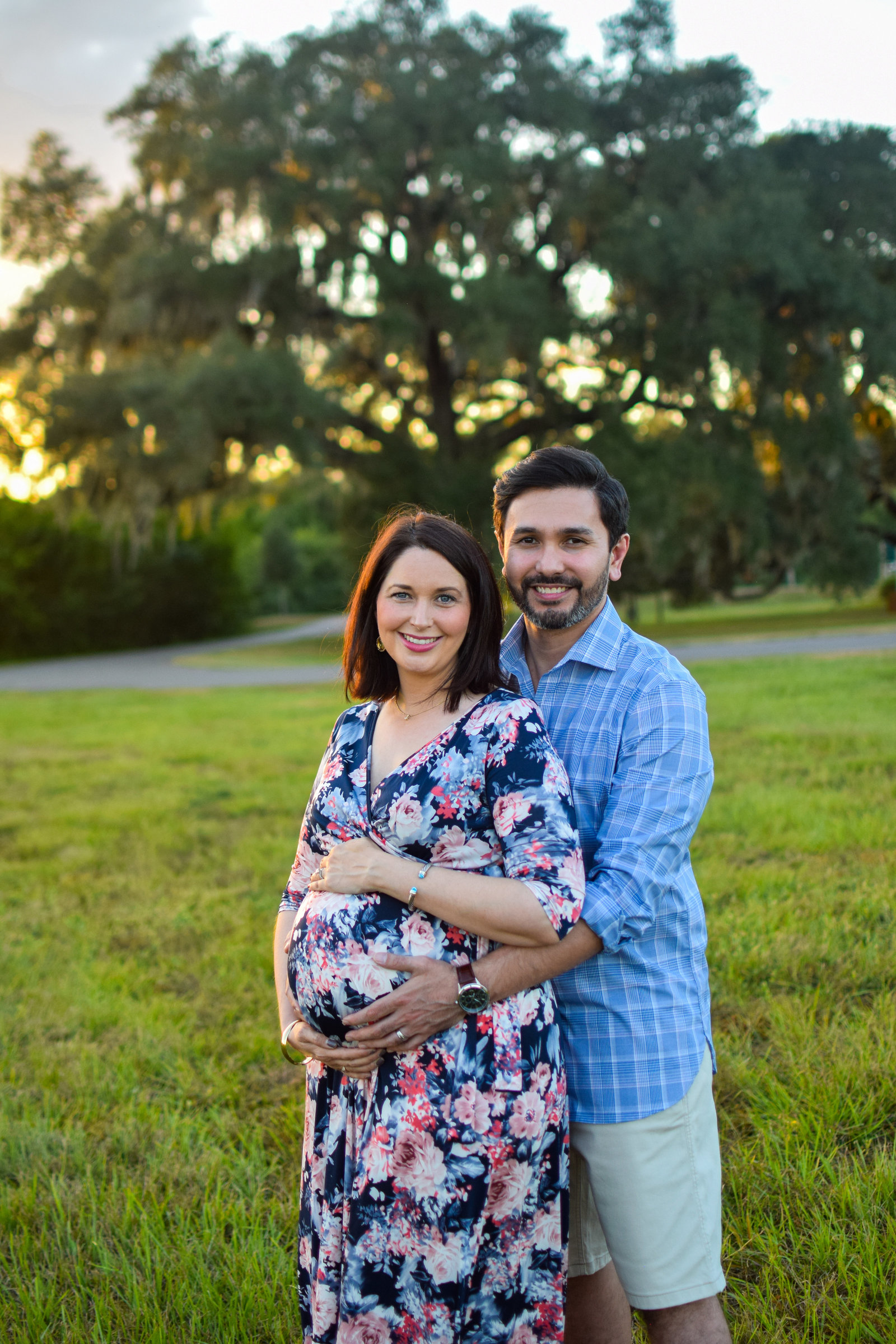 Maternity pregnant couple baby bump big oak tree  Tucker Ranch Winter Garden Florida