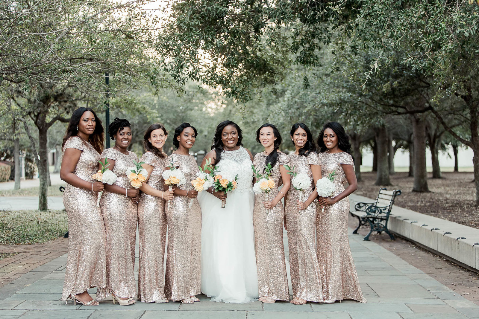 Bride poses with bridesmaids, South Carolina Aquarium, Charleston Wedding Photographer.