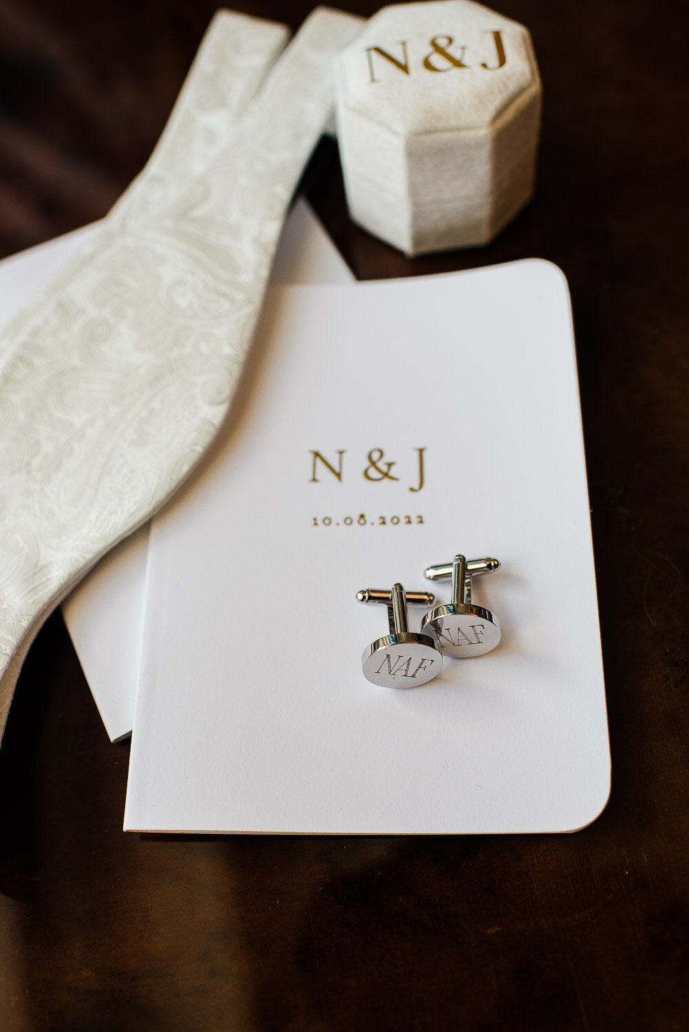 cufflinks vow book and tie detail