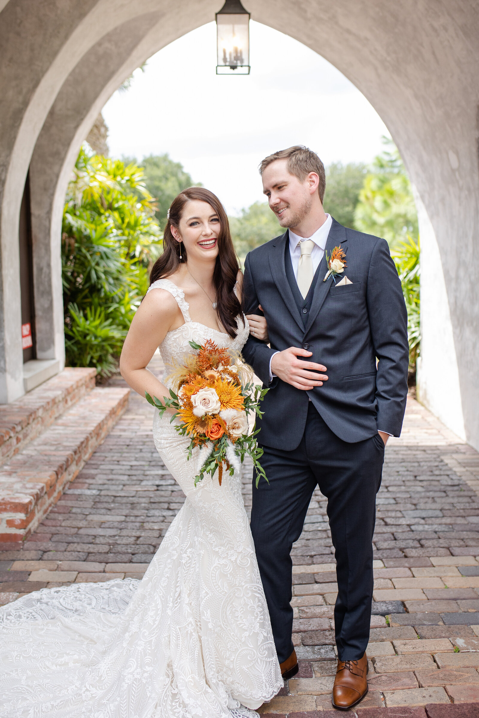 Newlywed bride and groom Florida wedding photographer.