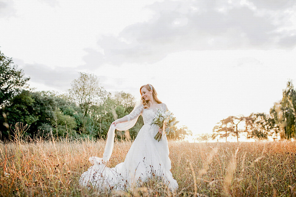 Fanhams-Hall-wedding-bride-sunset
