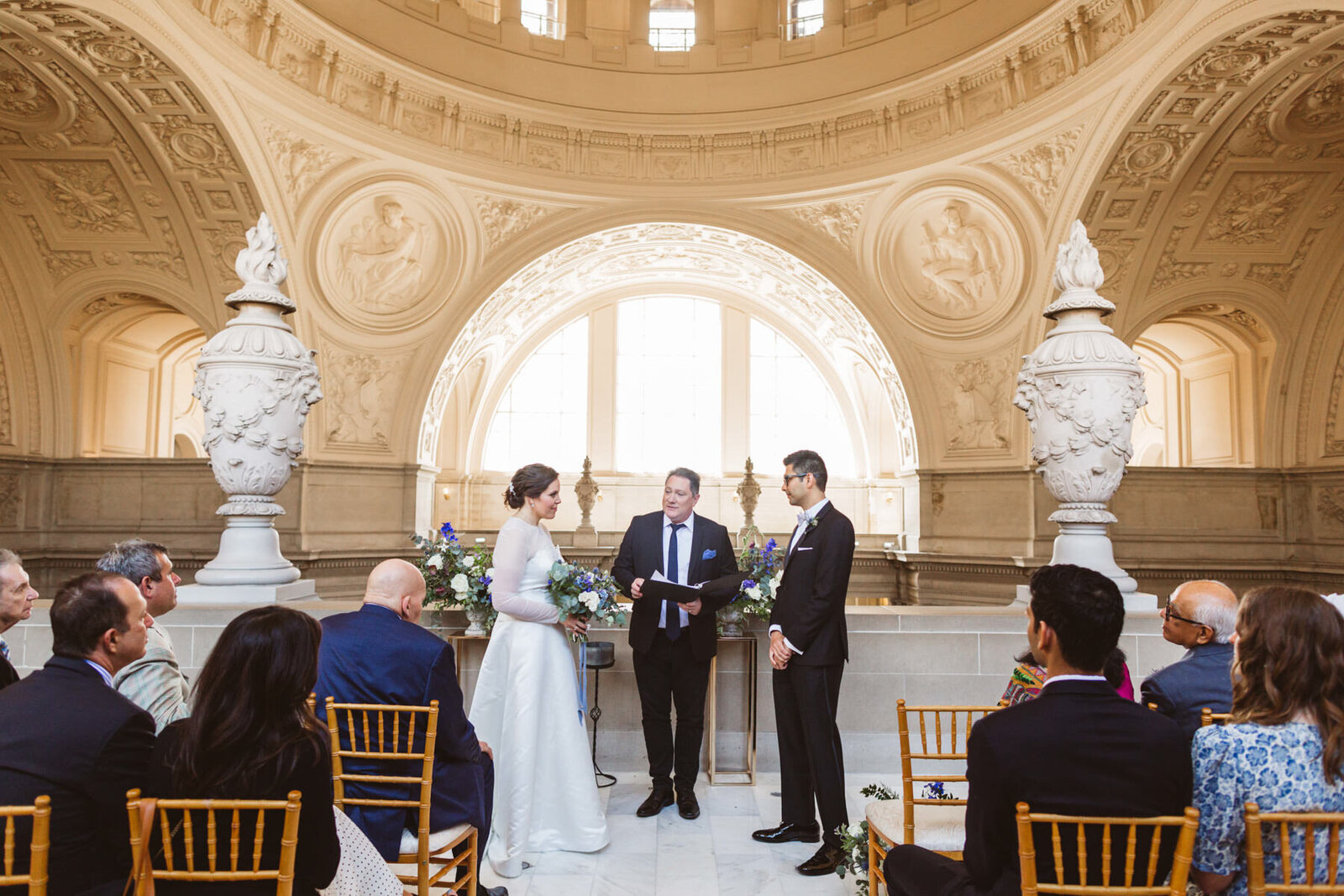 wedding ceremony taking place on 4th Floor of SF City Hall