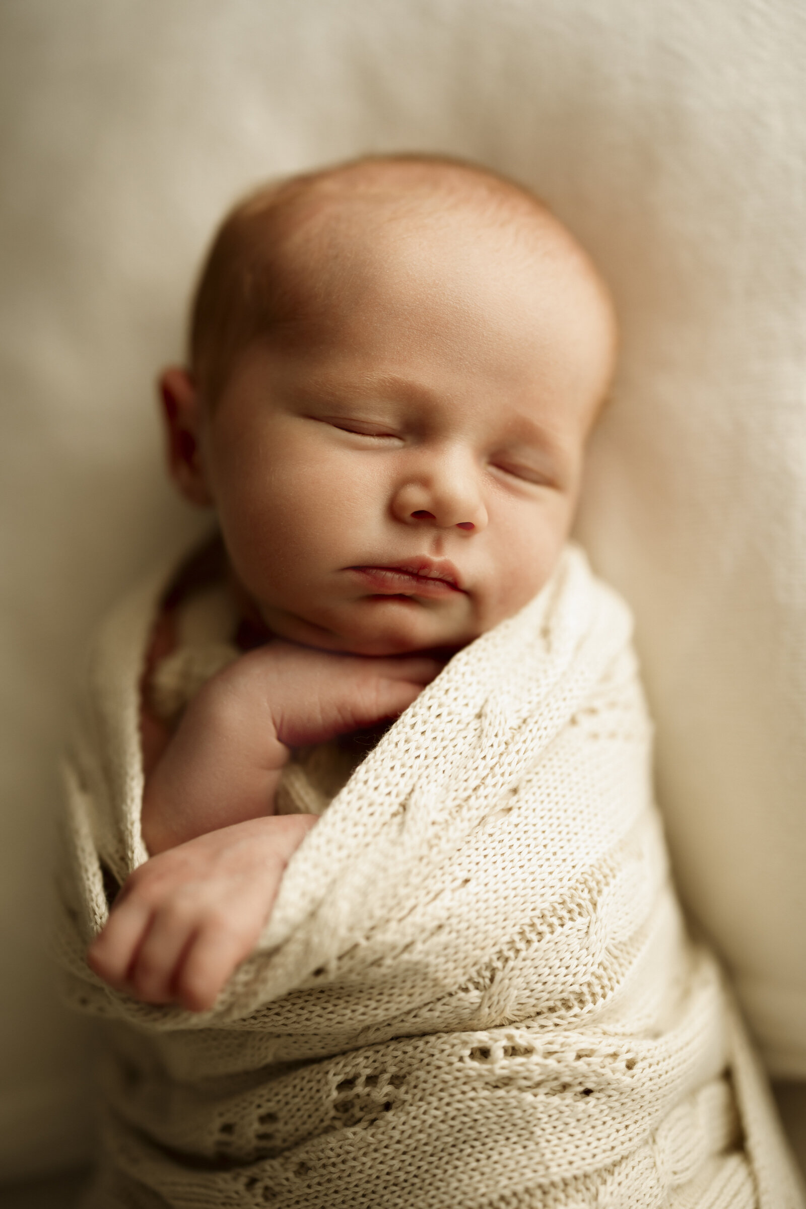 Candid newborn family photography in a Perth studio – relaxed, emotional, and full of love.