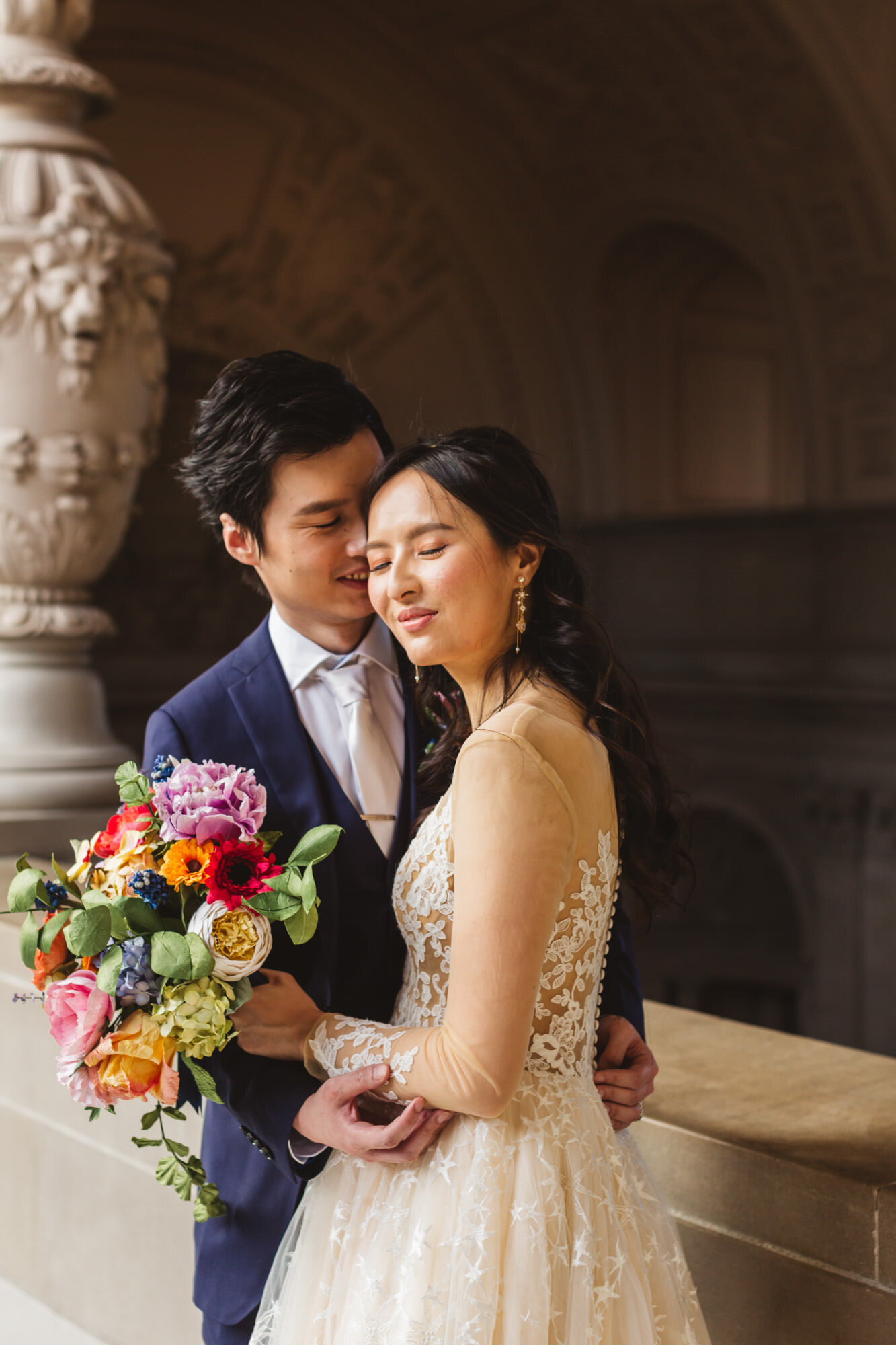 Asian wedding couple on San Francisco City Hall 4th Floor