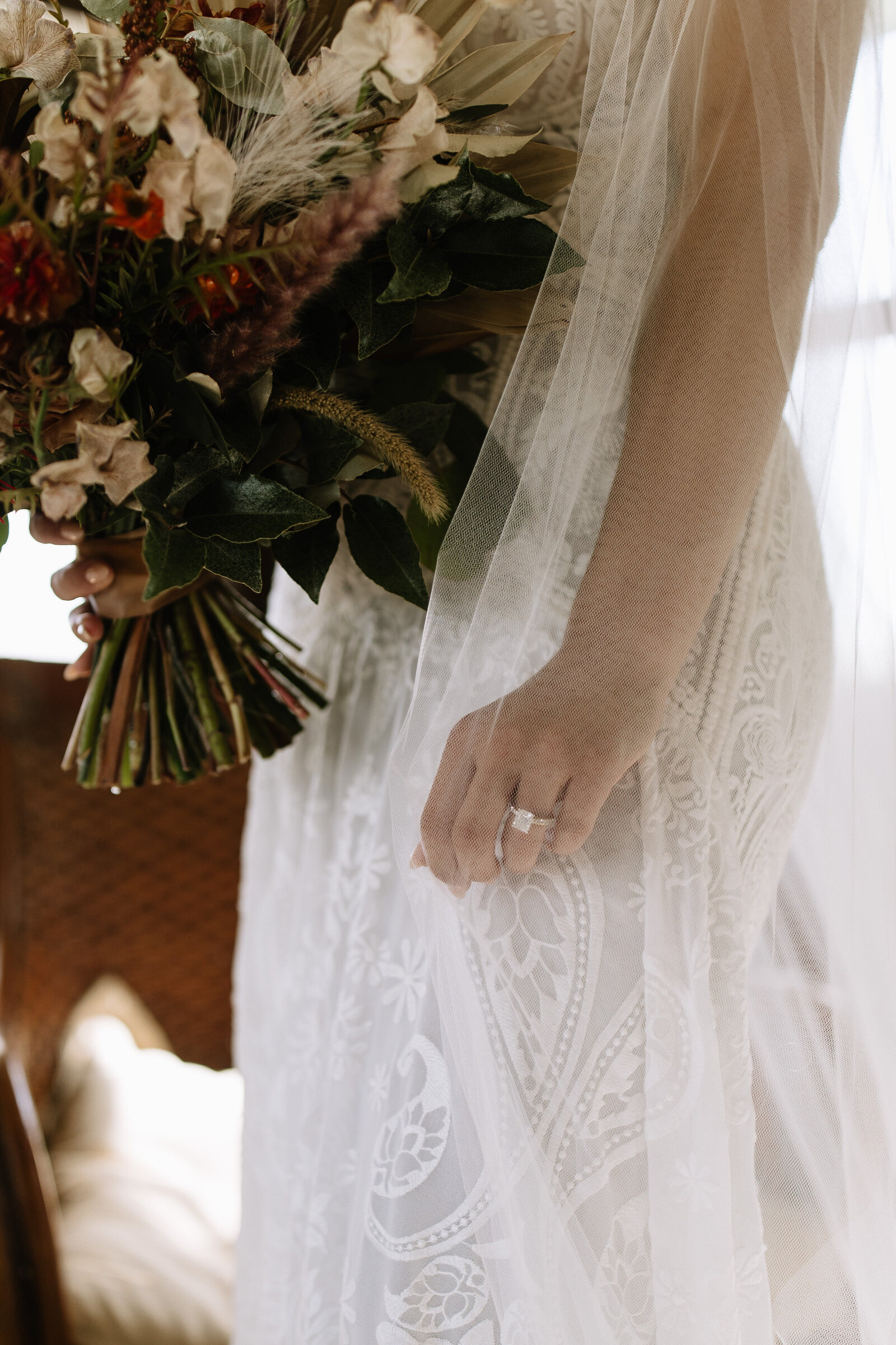 Close up of bride's ring through veil at McCall, Idaho wedding