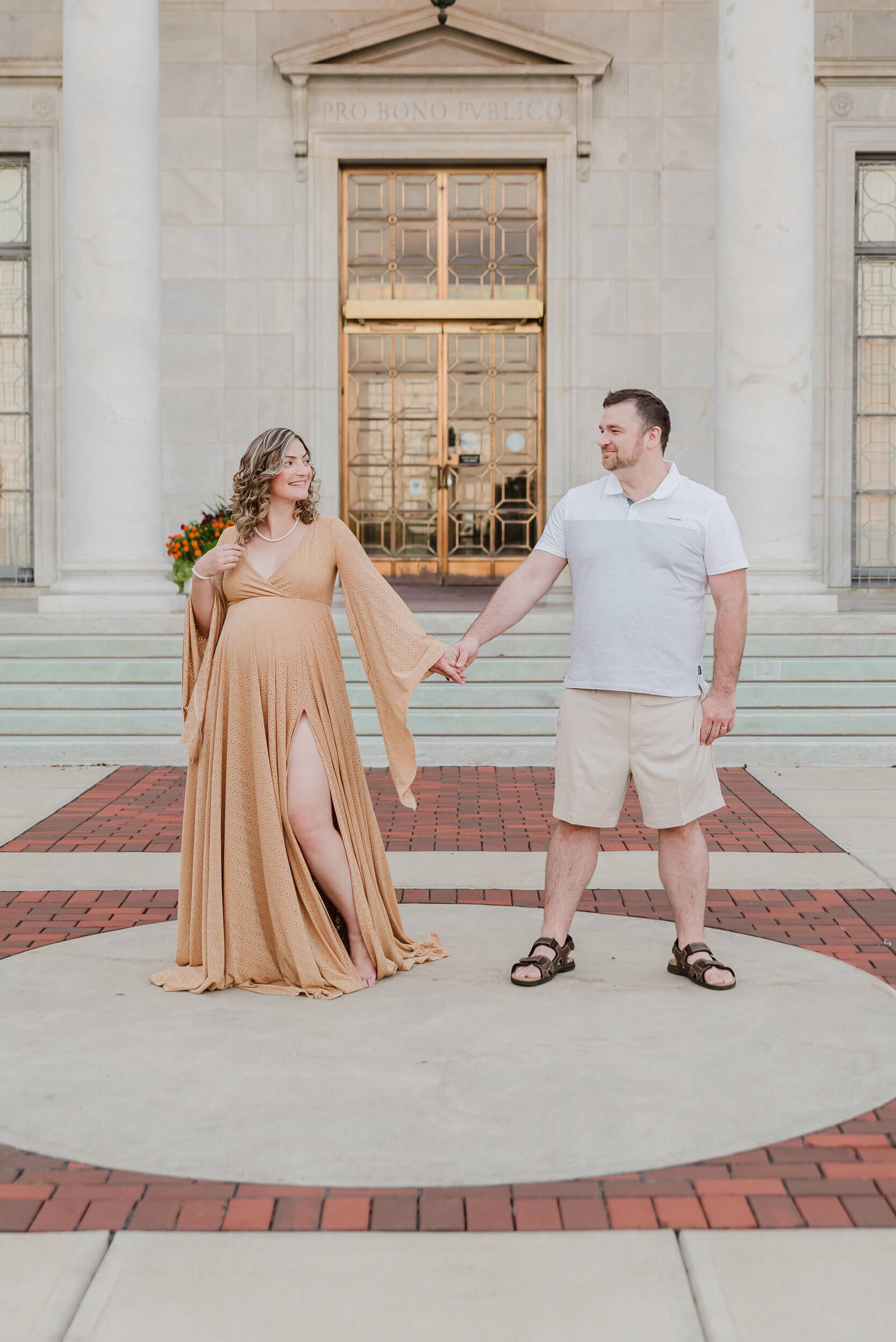 Maternity photo session at the iconic Butler Art Museum of American Art in Youngstown Ohio capturing a beautiful moment of anticipation.