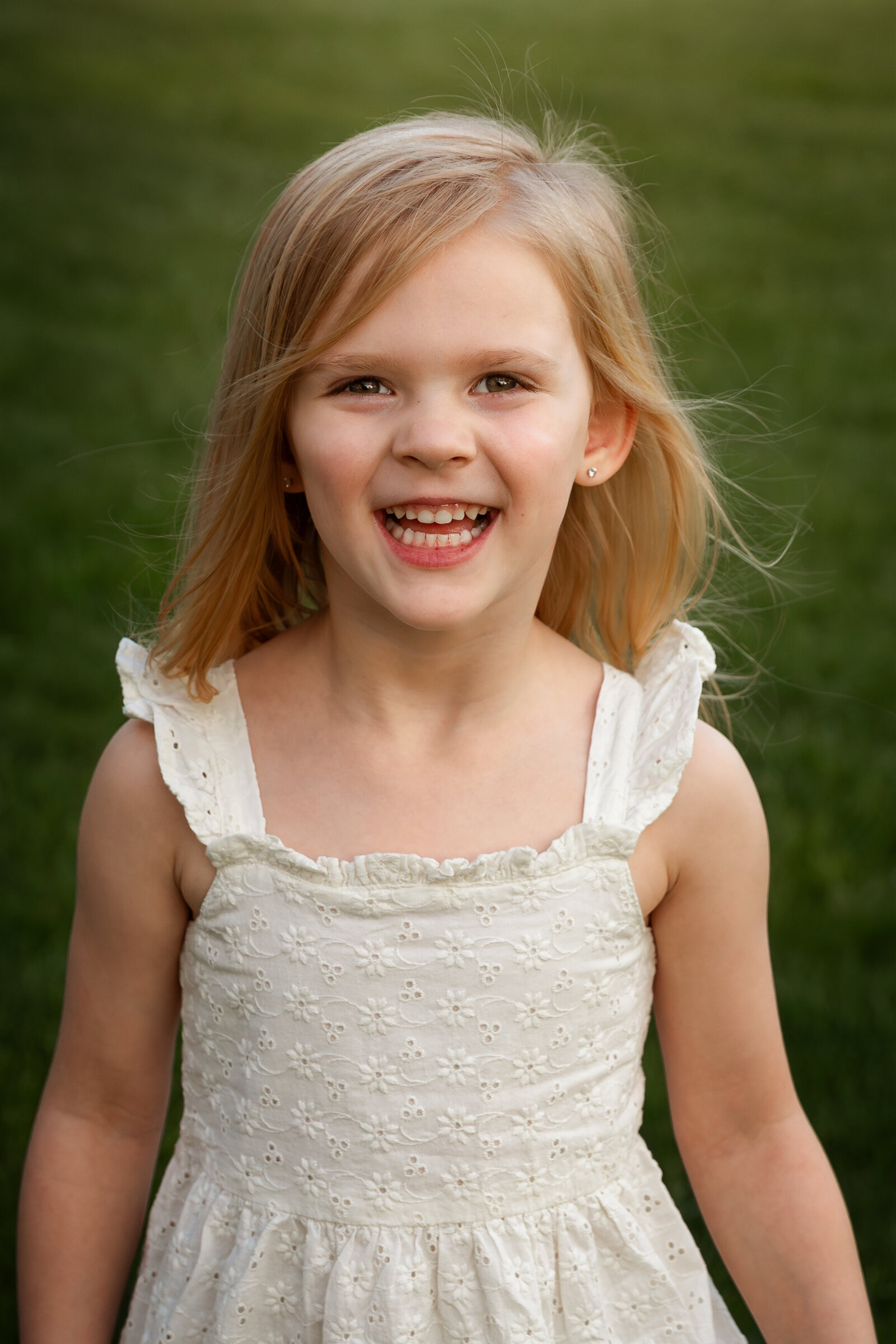 laughing-kid-central-park-morristown-family-photographers-nj