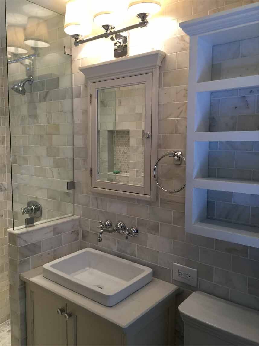 Bathroom with grey tiles