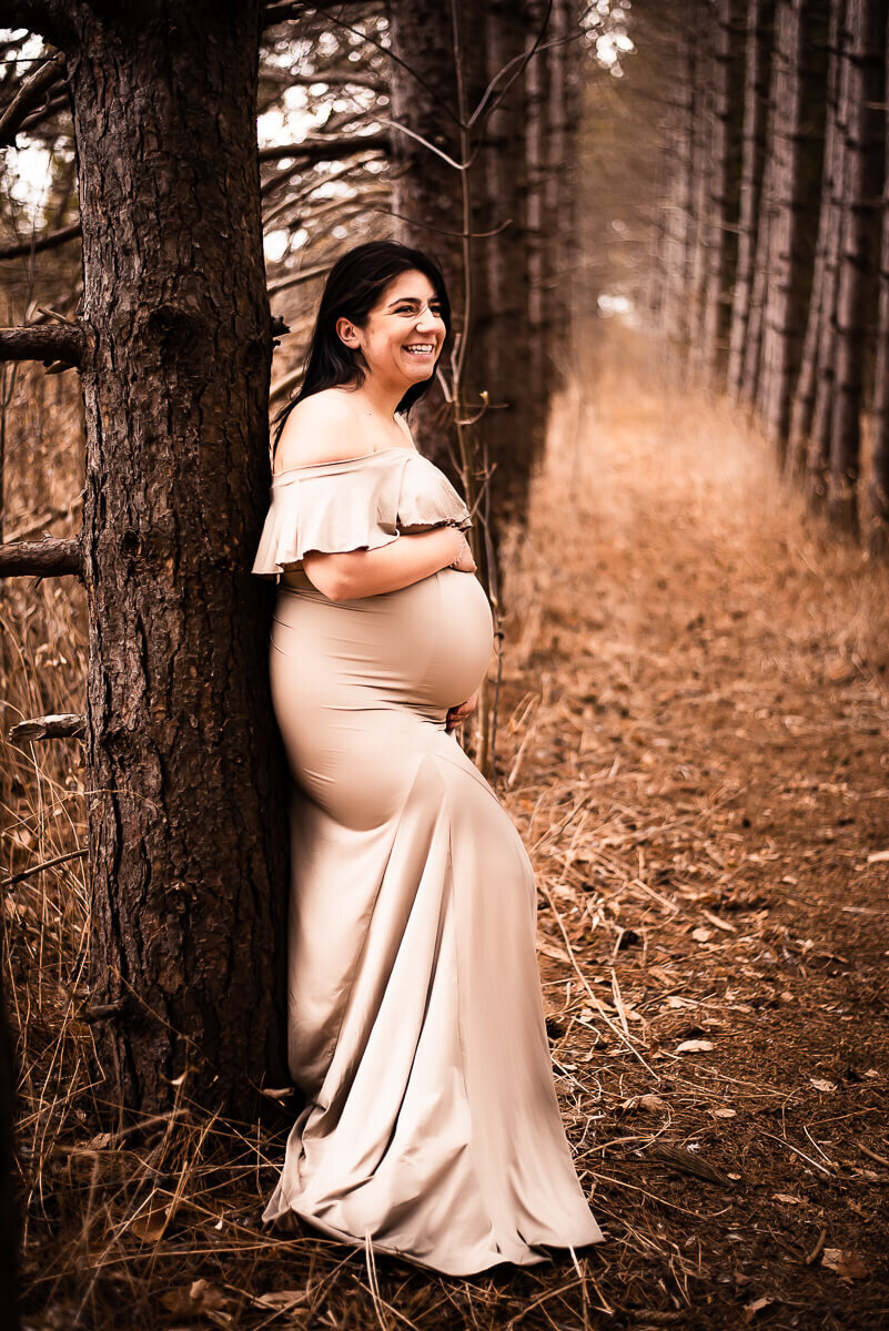 Glowing mom in champaign maternity gown for Toronto maternity photography