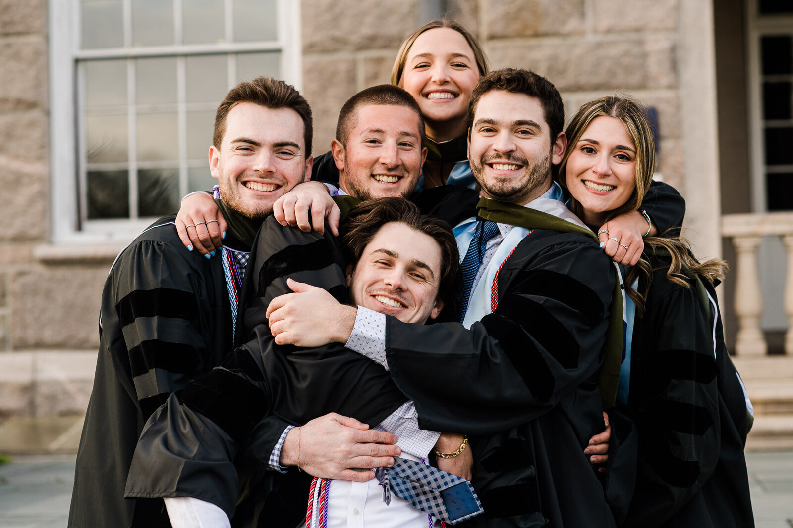 grad group big hug in robes 