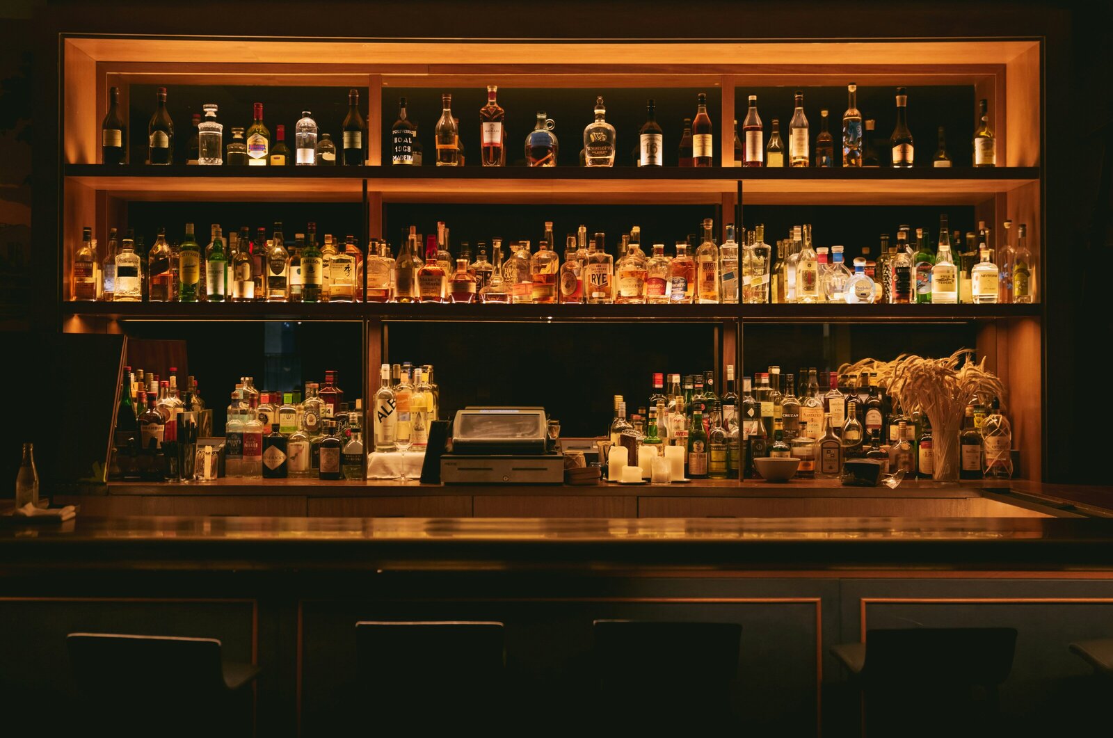 Whisky bar with premium bottles, craft cocktails, and a cozy vibe. Kelsey Parry Travel curates the best food and drink experiences worldwide.
