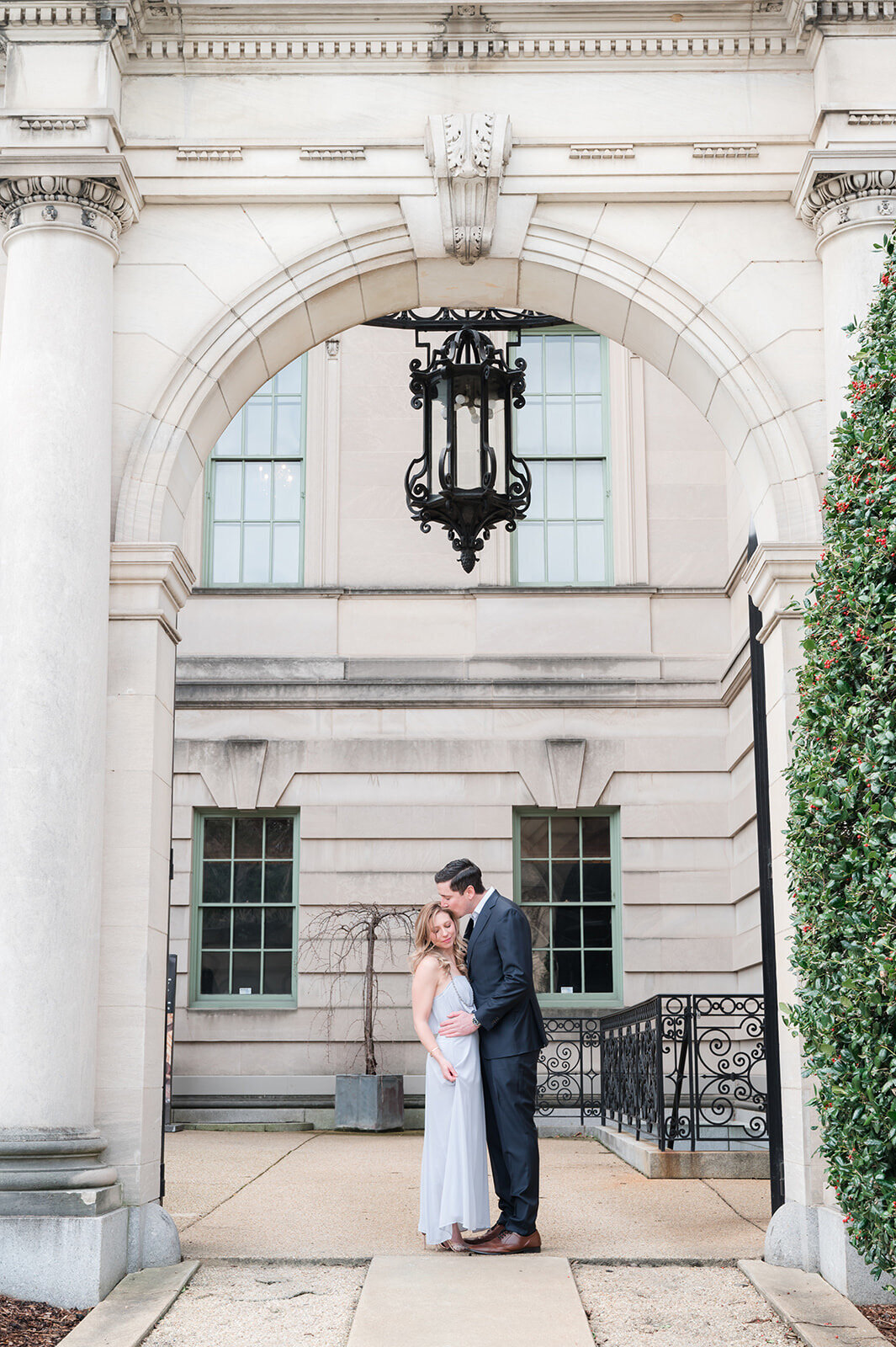 Larz Anderson House engagement photo in Washington DC with couple walking outdoors.3
