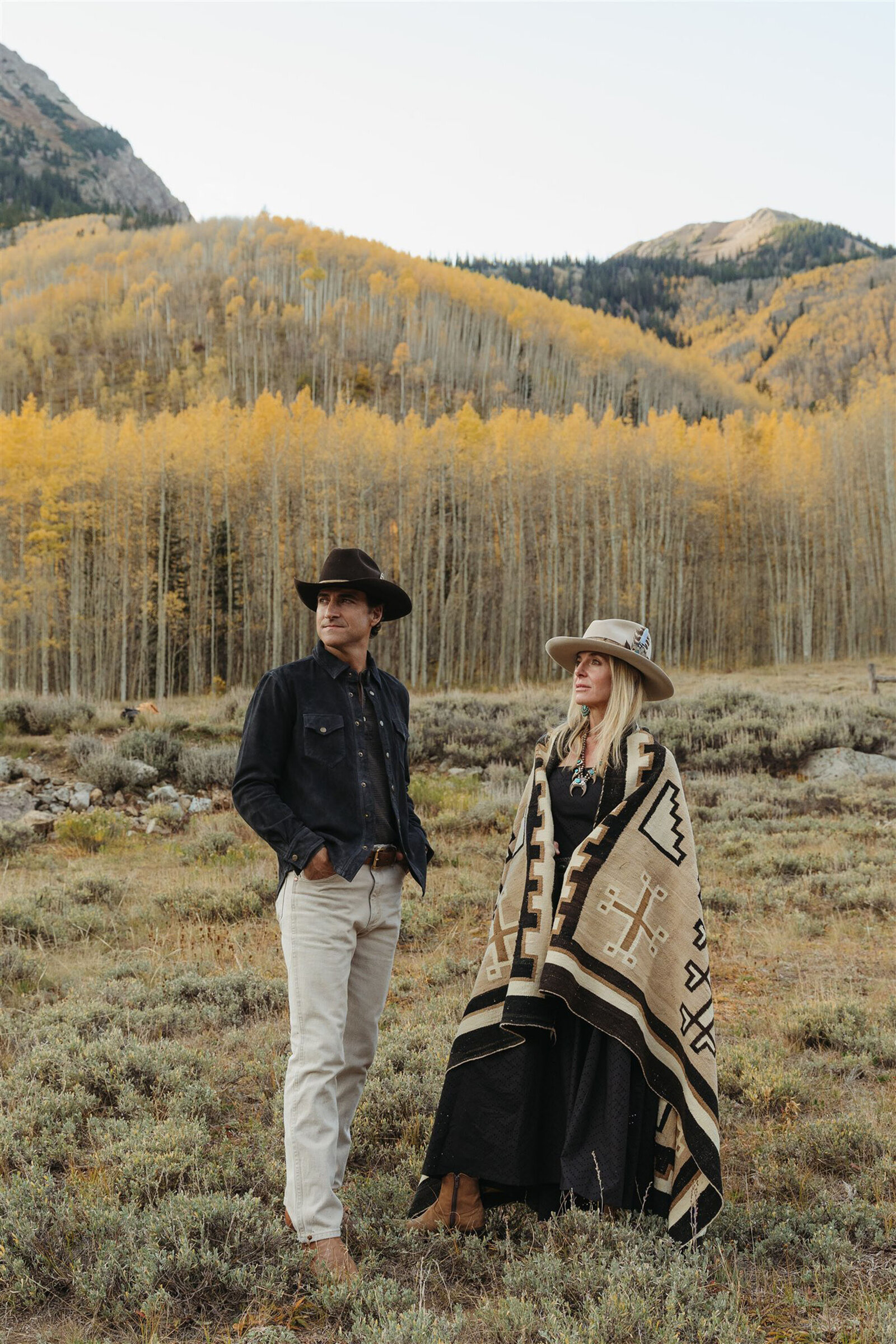 Aspen family photography with a Ralph Lauren aesthetic — navy, camel, and cream tones against alpine greens in the Roaring Fork Valley.