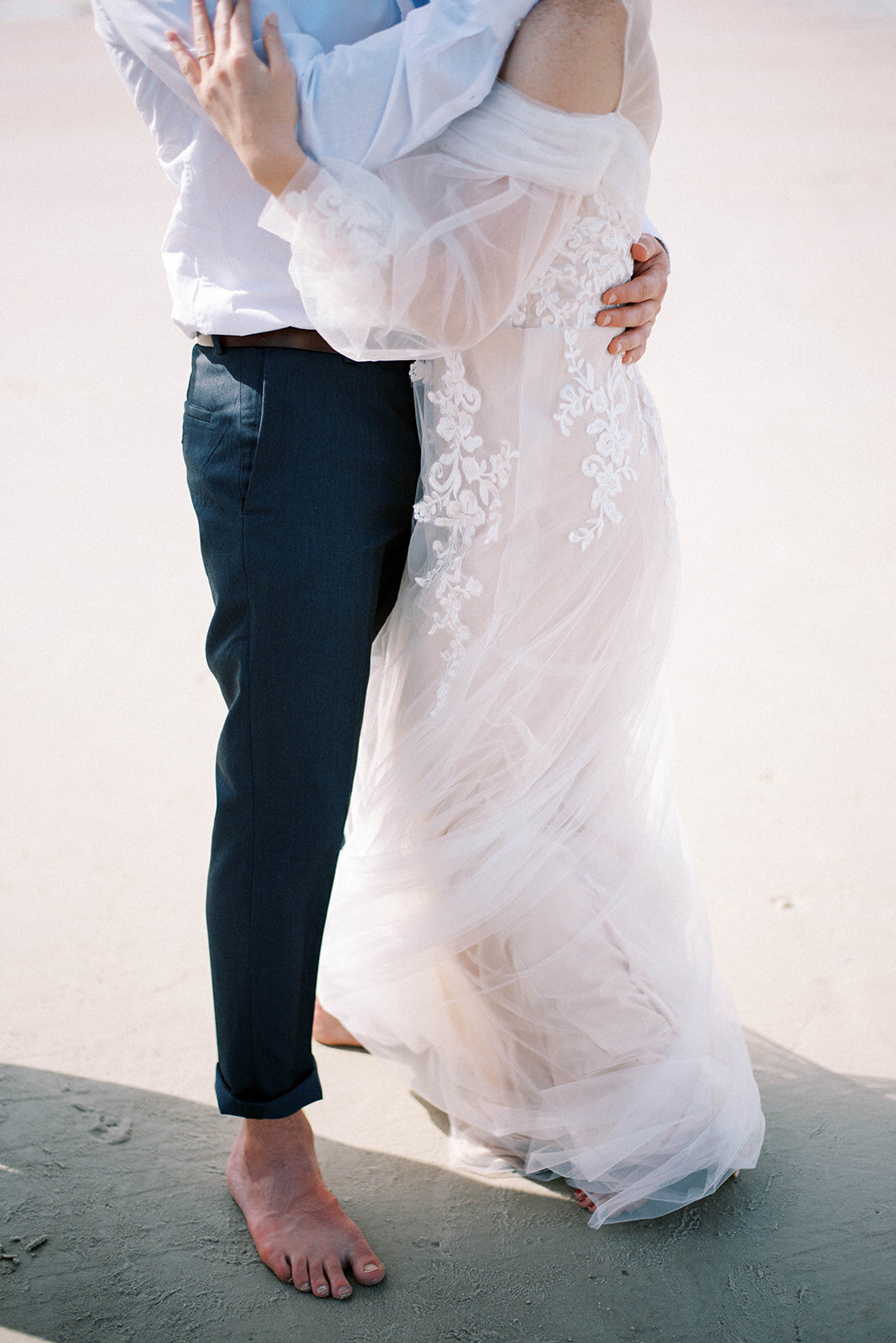 couple dancing on beach during first dance