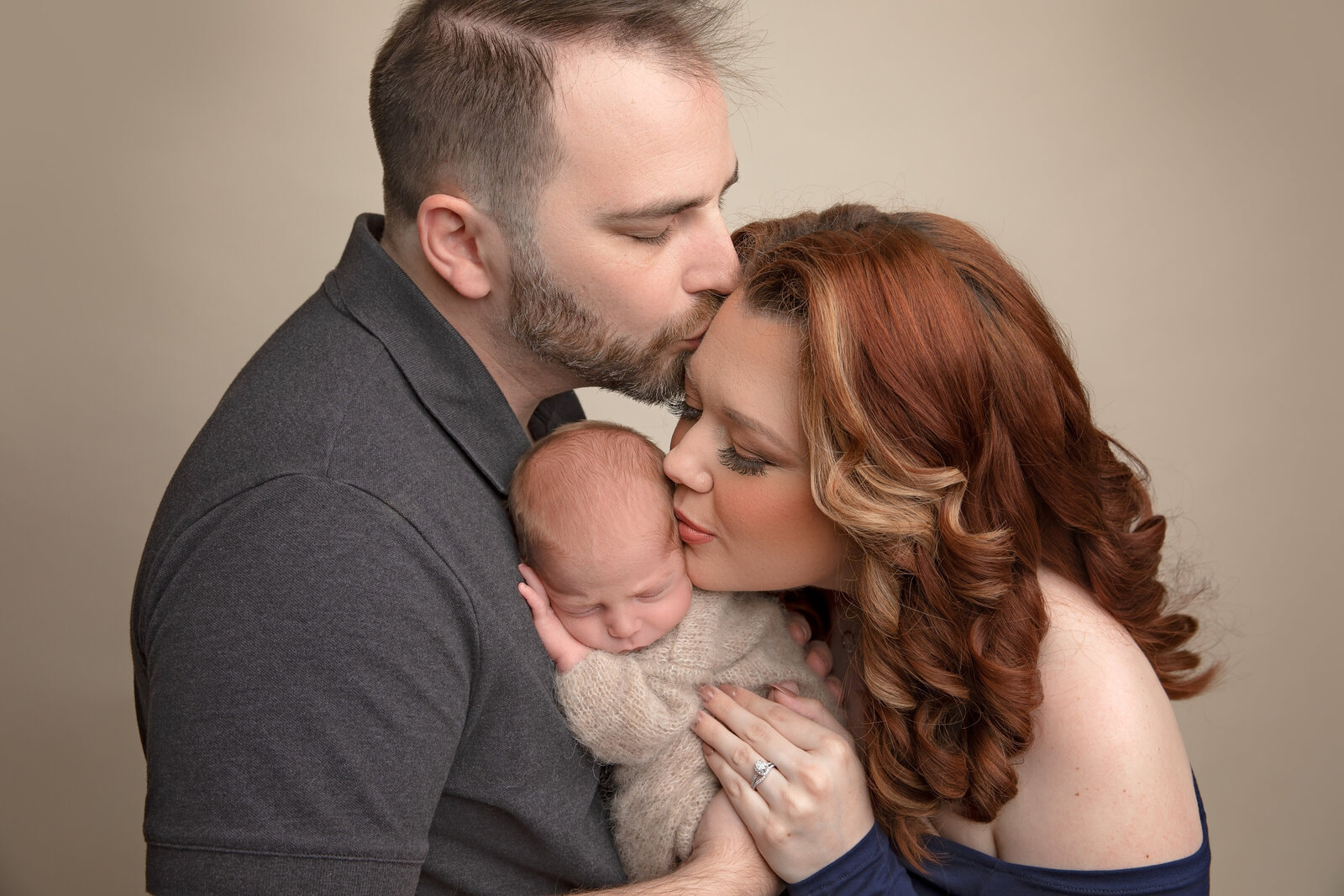Heartfelt newborn and father portraits, showcasing the strength, love, and protective bond between dads and their newest family member.