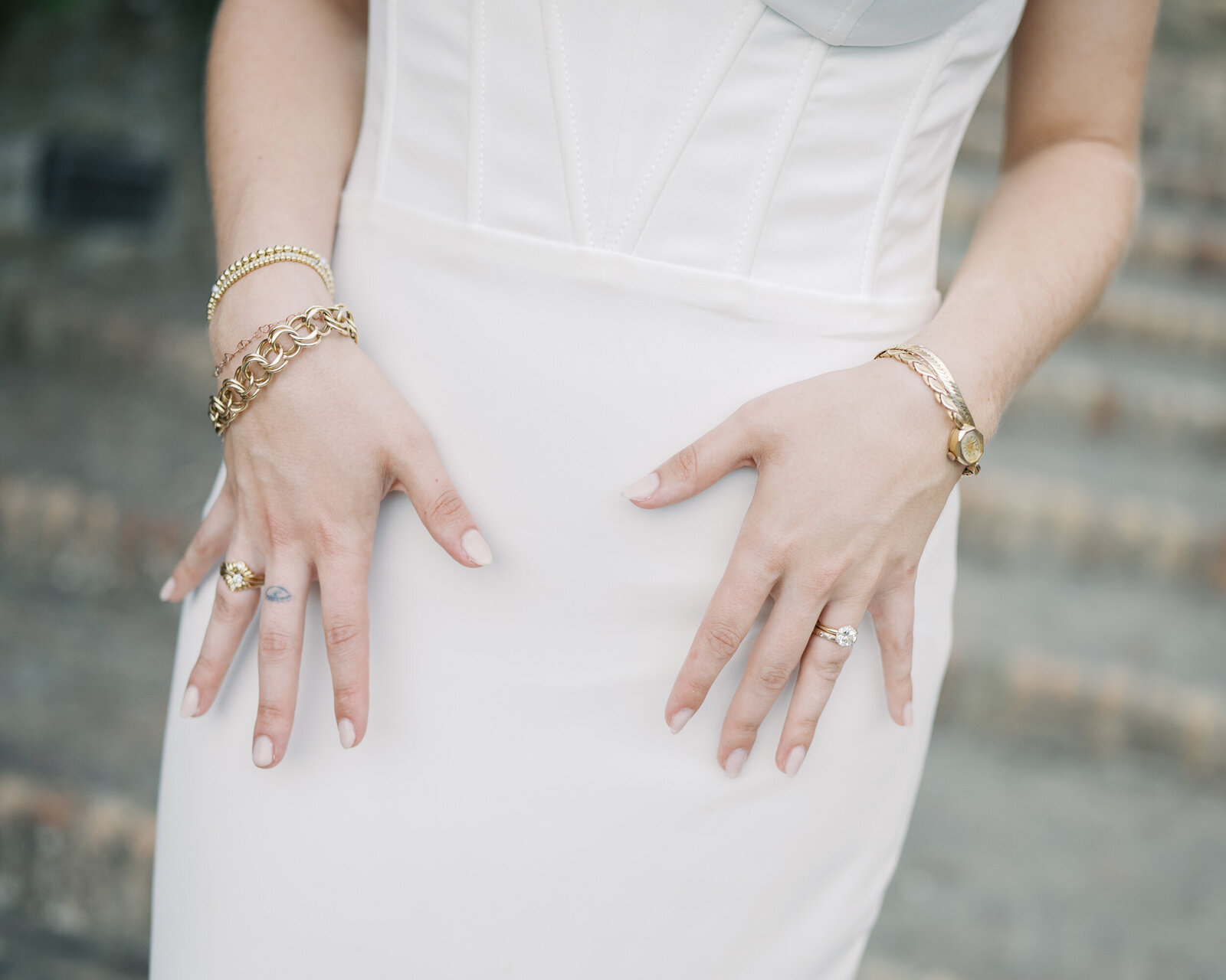 The bride showing her wedding jewelry | Megan Smith Photography