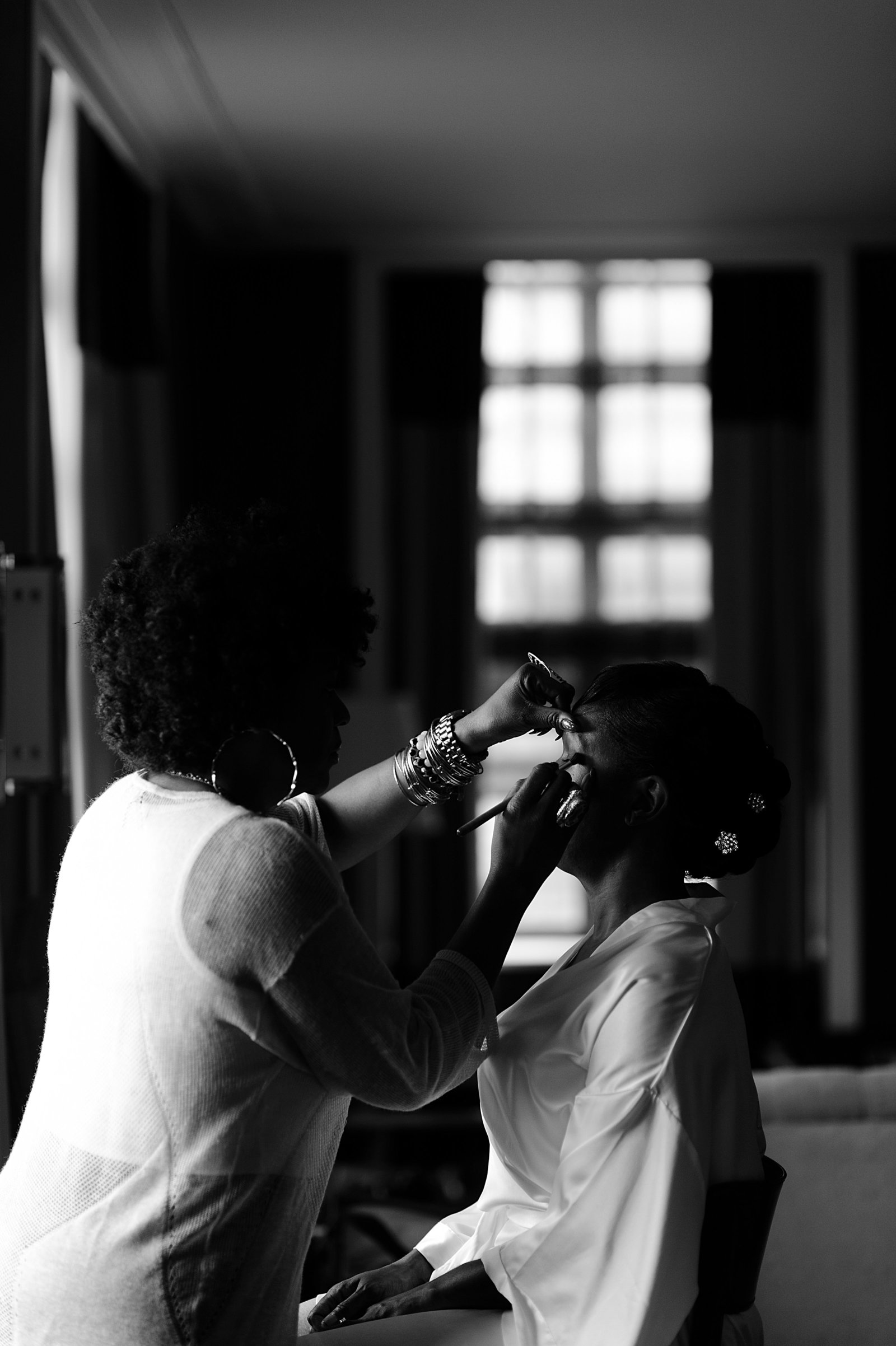 Getting ready at Hotel Palomar with makeup by Beauty N' the Bride photo by Girl Photography