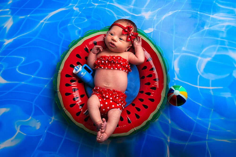 summer-newborn-photography-swimming-pool-creative-colorful-unique-watermelon-floatie-bikini-polka-dot-red-blue-stanley-amazing