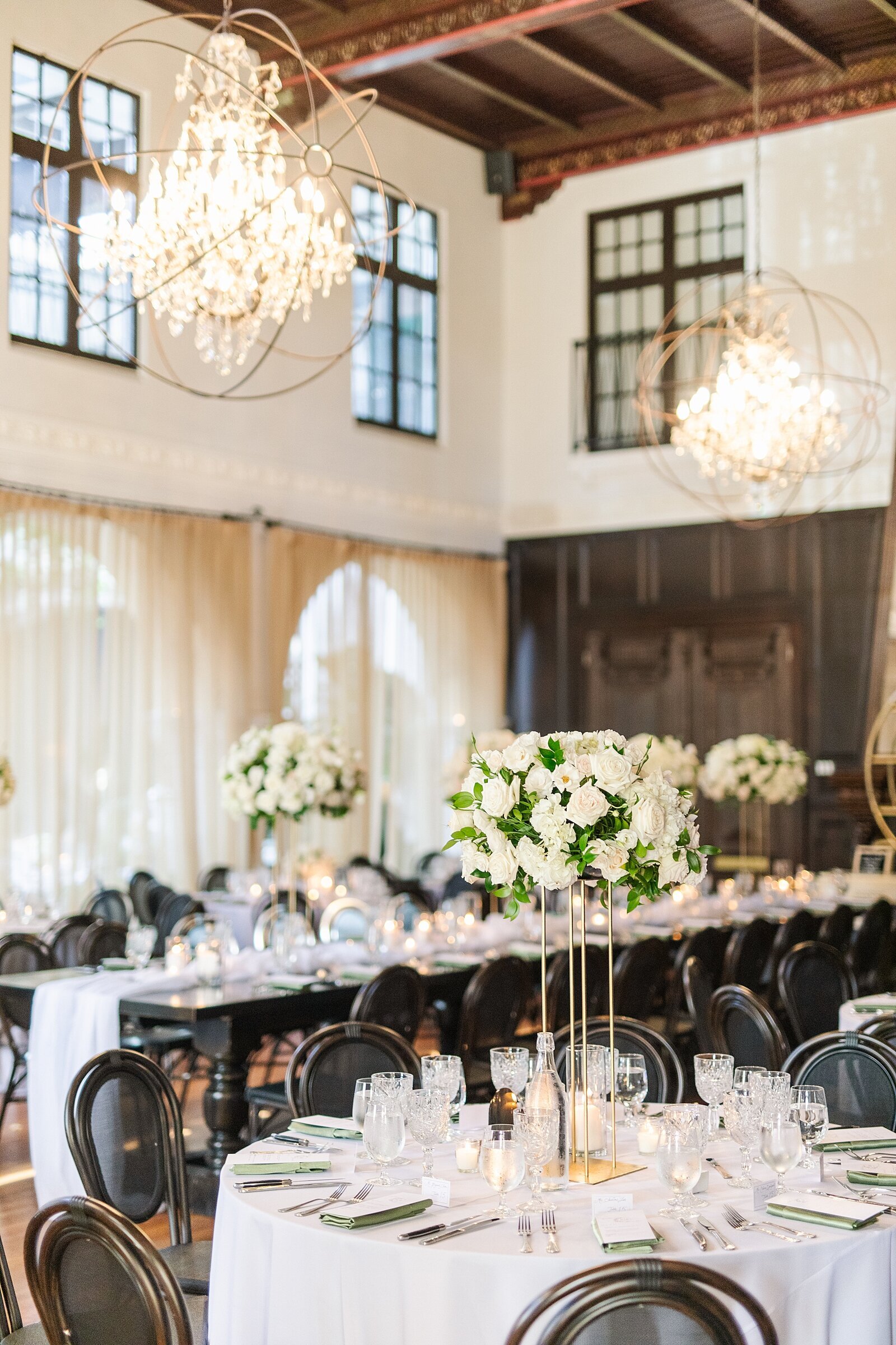 Wedding reception decor and floral centerpieces at Waldorf Astoria Monarch Beach Resort and Club in Dana Point, California by wedding photographer, Sherr Weddings, based in Orange County, California.