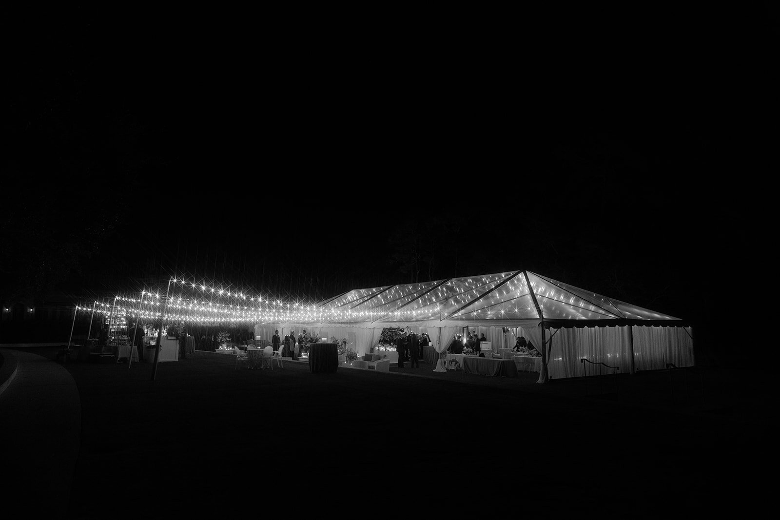 Tented wedding in alys beach glowing at night