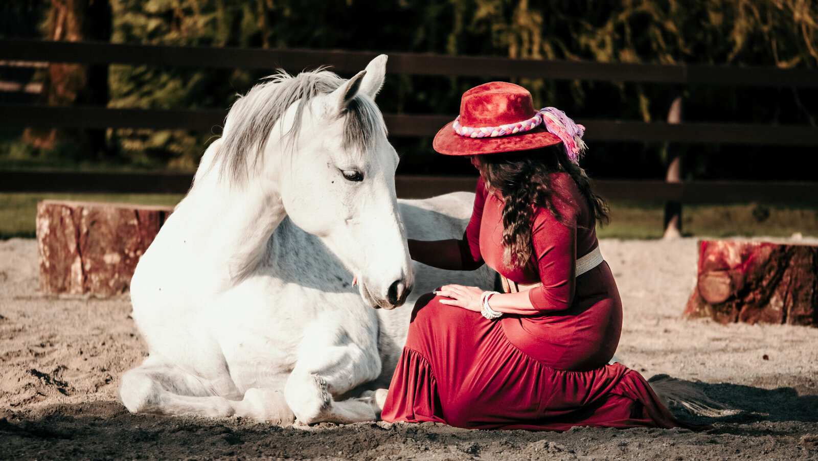 A Woman enjoying her horse