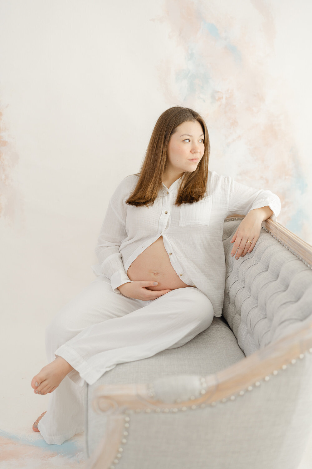 mom looking out during a  Gainesville, Virginia studio maternity picture